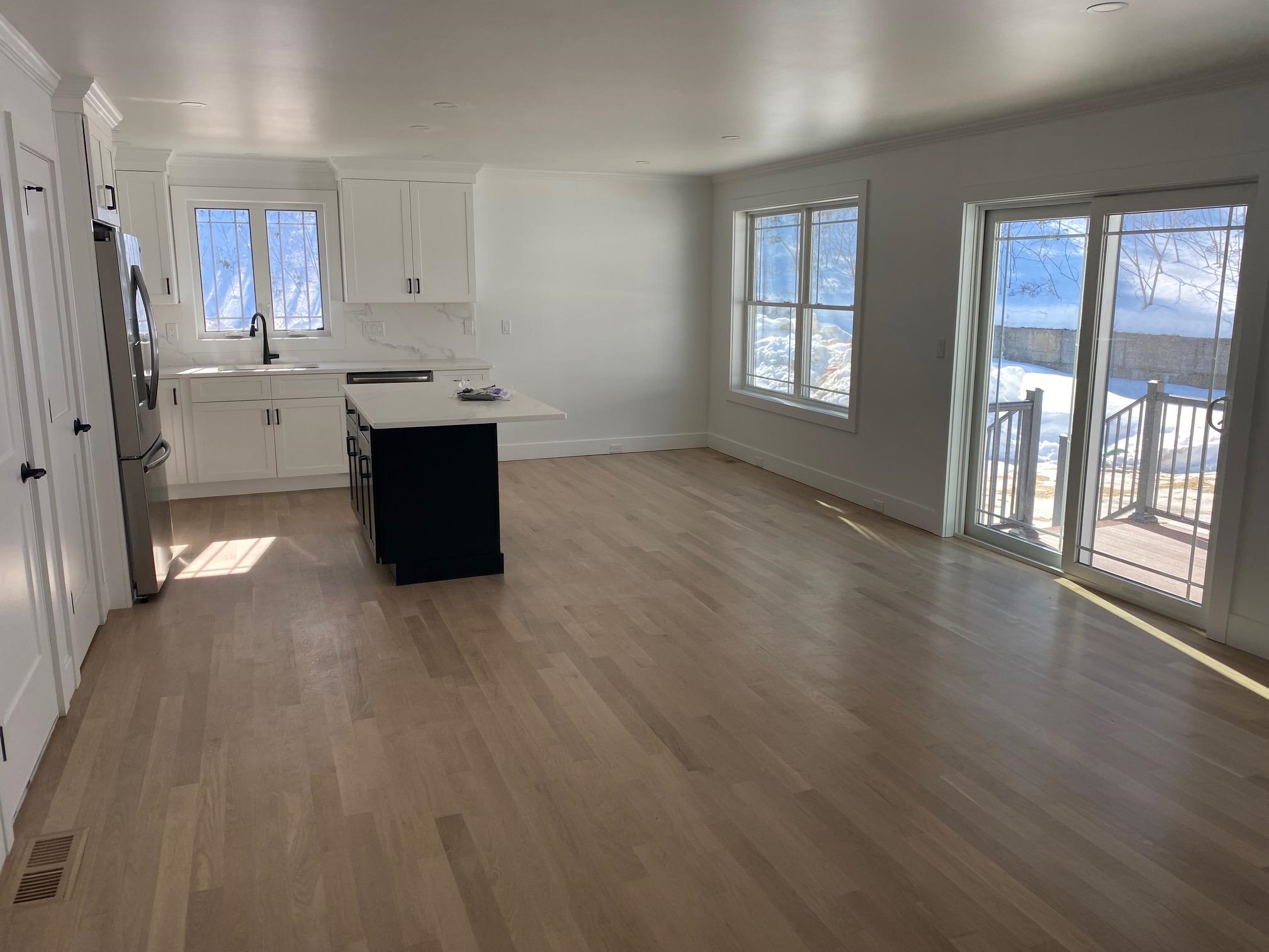 Open Kitchen, dining, living with white oak floors 24792459