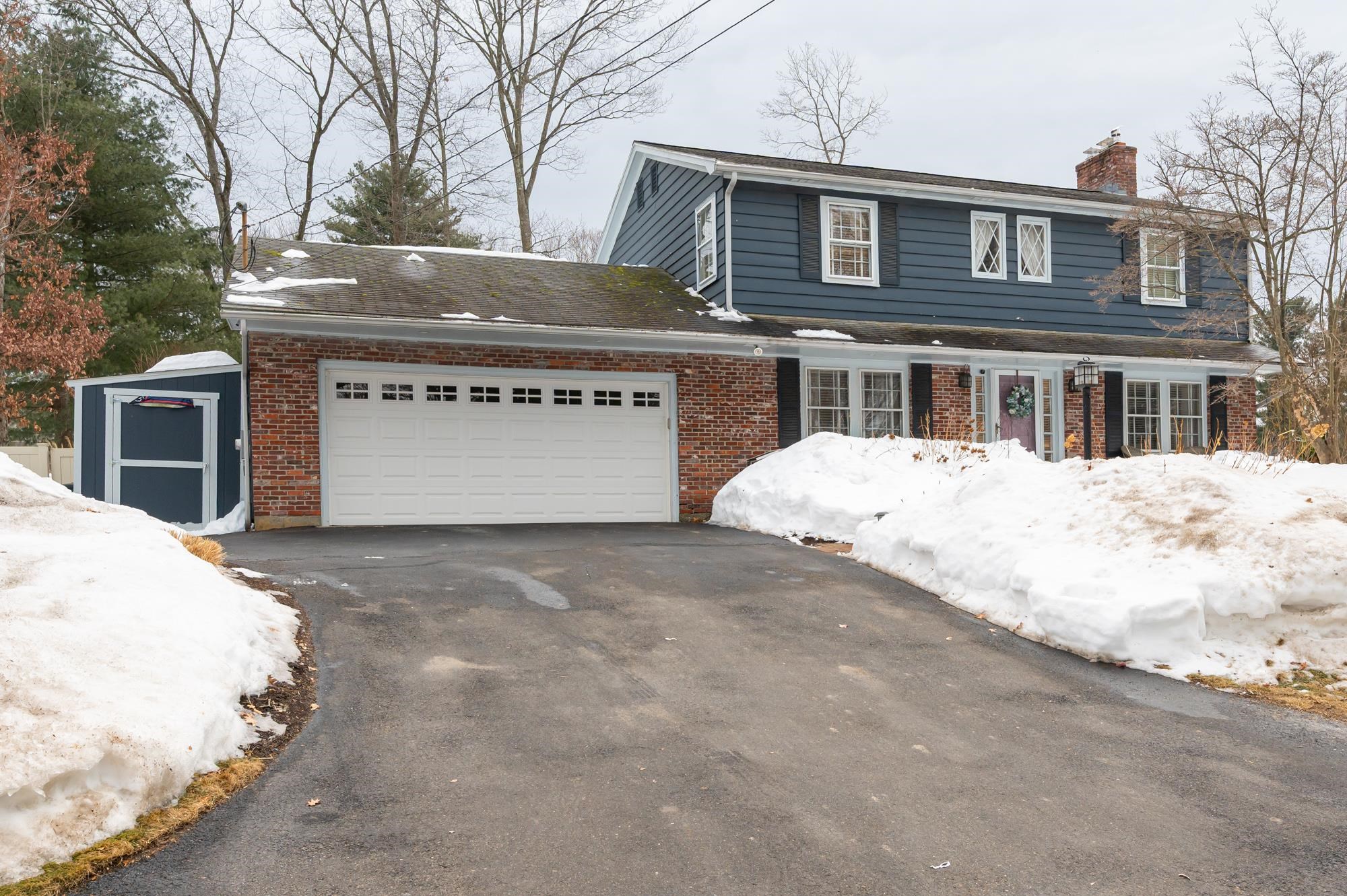 Welcome to this beautiful, sun-filled Colonial in the highly sought-after Farmington Acres neighborhood.  The first floor offers exceptional function and flow, beginning with a spacious mudroom that provides direct access to the two-car garage and an inviting outdoor living space — effortless convenience for everyday life. The thoughtfully designed kitchen features a central island, an eating nook, and a formal dining area, all seamlessly connected to a bright sunroom with easy access to the stunning, fenced, and landscaped backyard with irrigation system.  A front-to-back living room with a fireplace completes the first floor creating smooth movement between indoor and outdoor spaces, ideal for entertaining or relaxing.   Upstairs, you’ll find three generously sized bedrooms plus a versatile bonus room-perfect as a walk-in closet, home office, or additional storage.   The finished lower level is a wonderful surprise, featuring a spacious area with a fireplace and a convenient three-quarter bath, making it ideal for multi-generational living or a guest room.  Recent updates include a new heating system, upgraded sunroom windows and slider, a shed, and a whole house generator.  Conveniently located near Exits 2 and 3, this home offers a fantastic commuter location just minutes from Nashua Country Club, Rivier University, and the Massachusetts border.  Open House: Saturday, February 21st from 11–1;  No showings on Friday February 20th.                   Seller reviewing offers Sunday @ 5pm.
