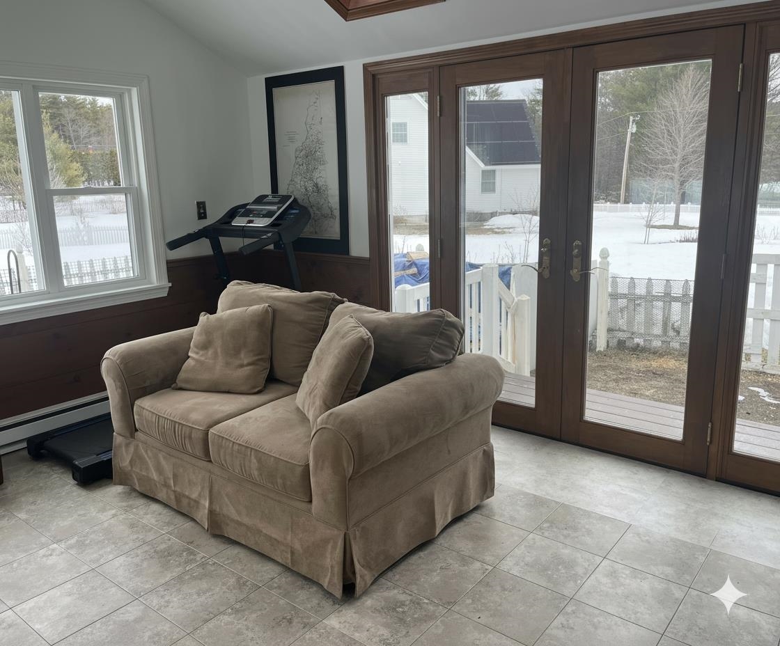 A bright sunroom provides the perfect balance of indoor comfort and outdoor connection.