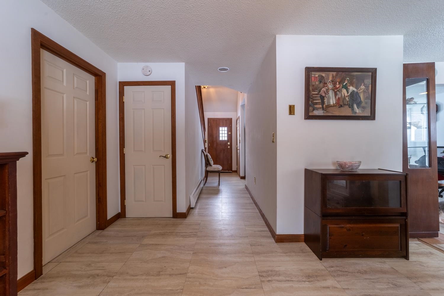 Spacious hallway enhances the home�s functional layout.