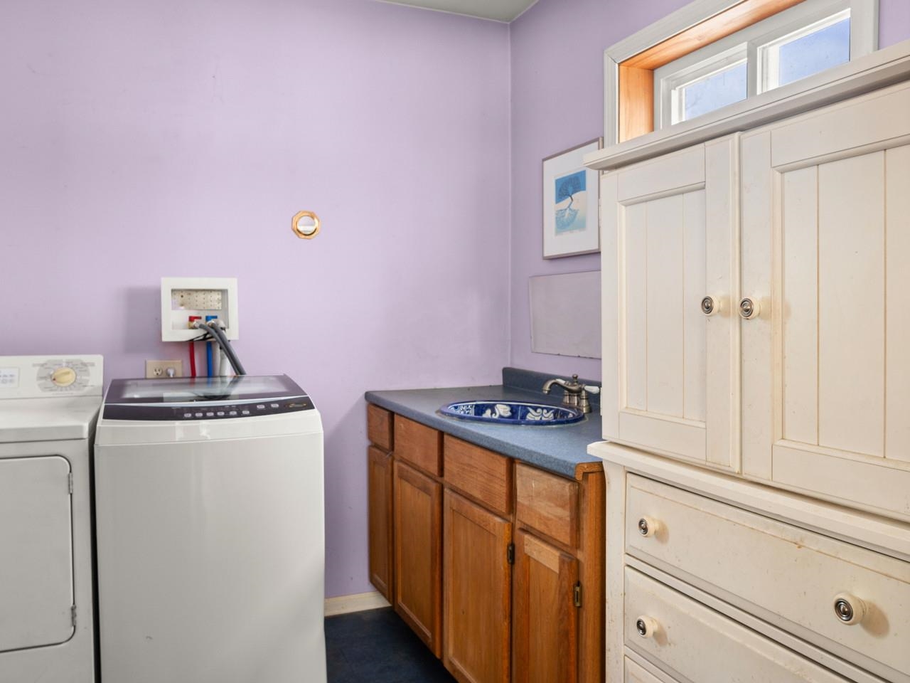 Laundry room with cabinets