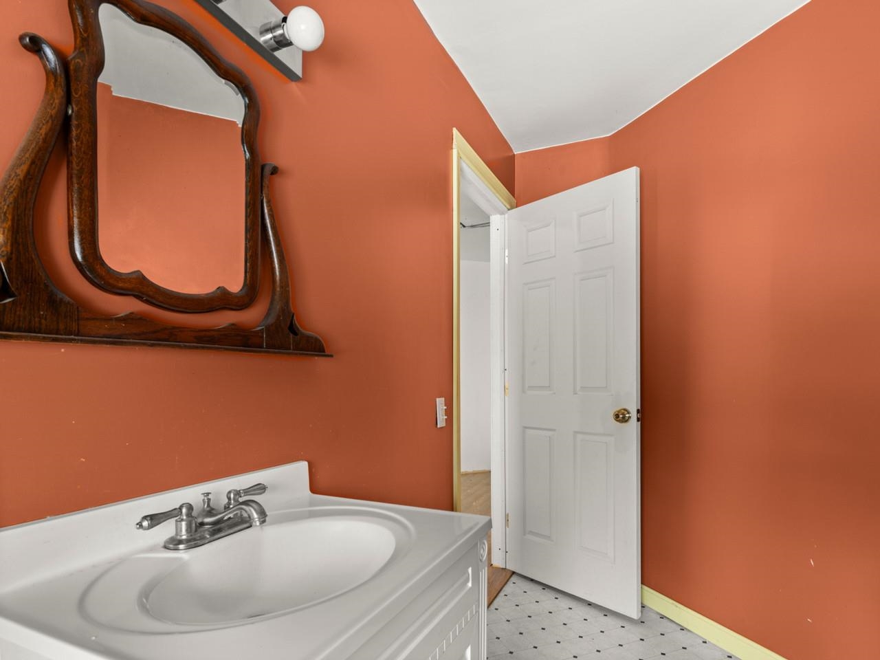 Bathroom with mirror & sink