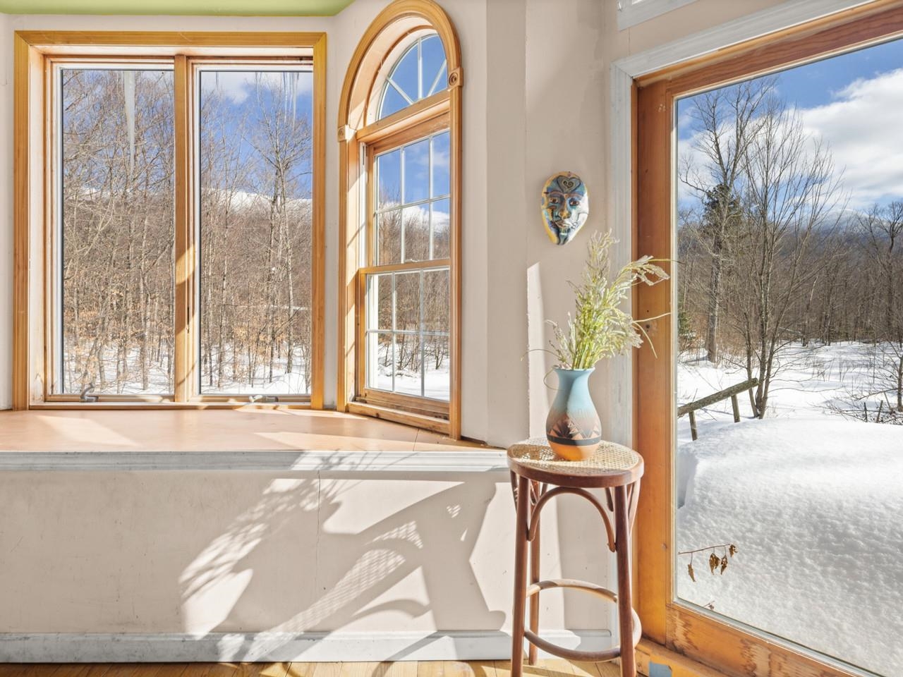 Snowy view through large panes