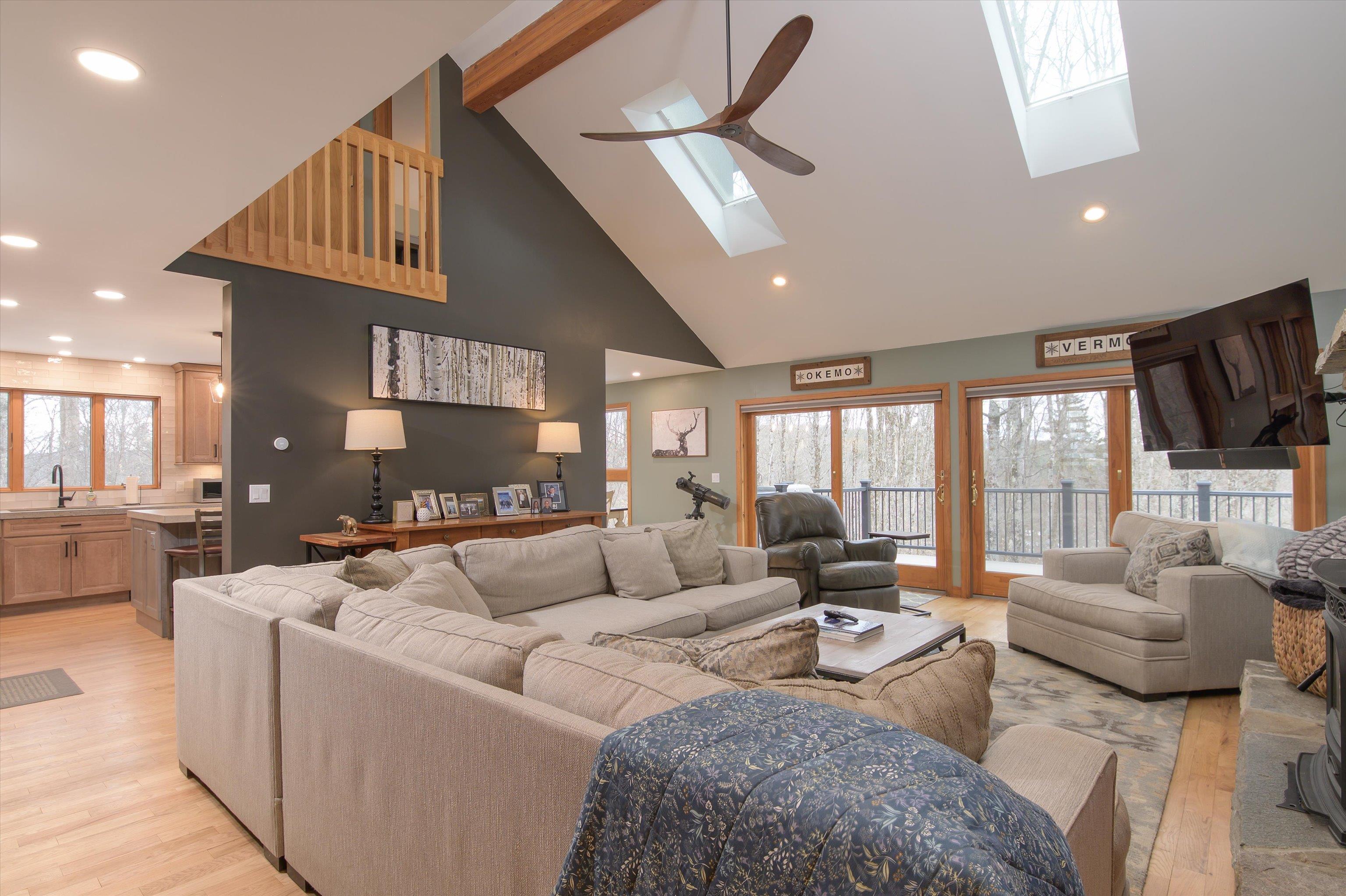 Many Features Including Wood Flooring and Sliders to the Deck