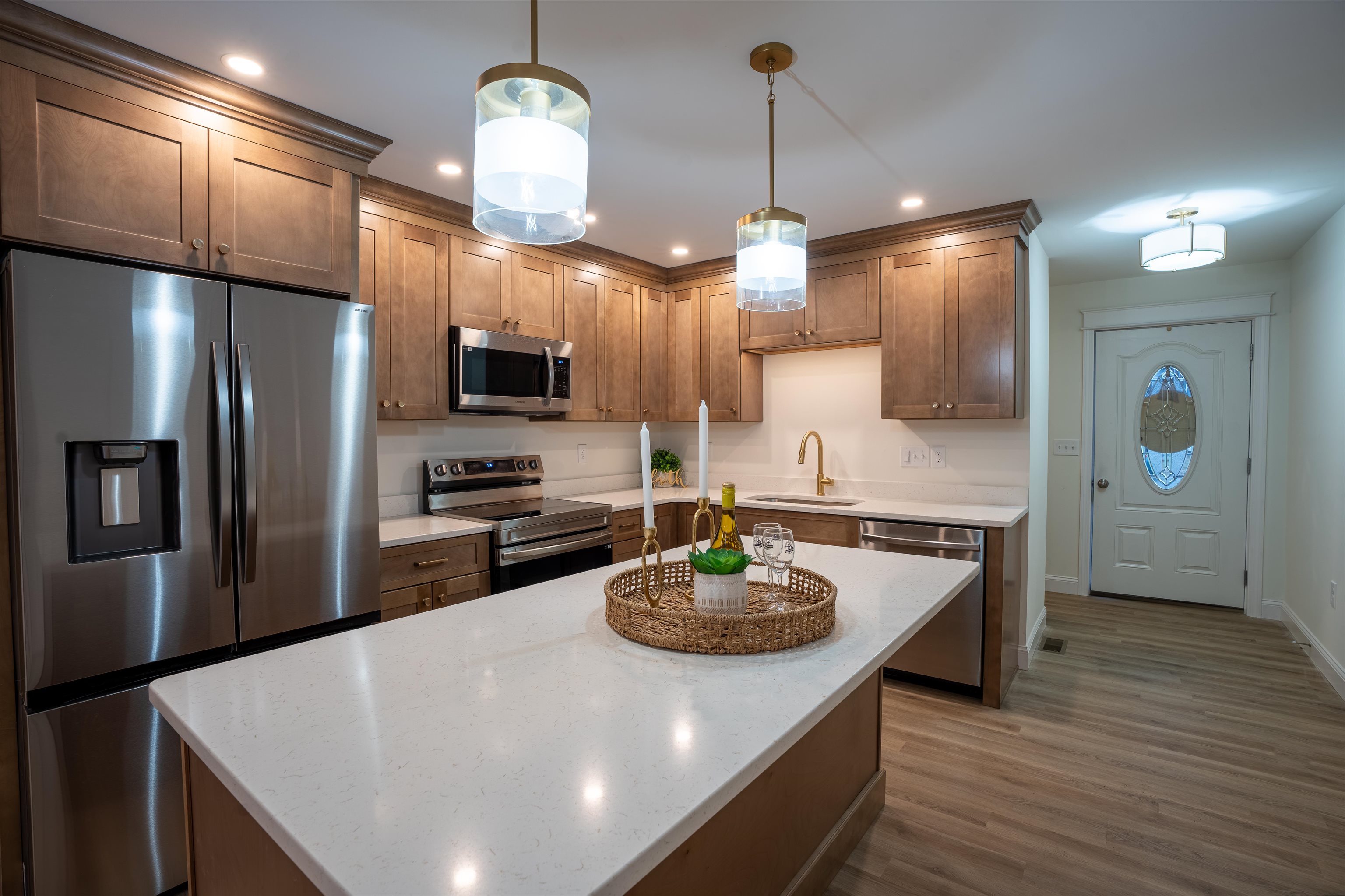 Step into something truly different—this is not your average cookie-cutter new construction. Thoughtfully designed and built with quality craftsmanship at every turn, this stunning modern home offers flexibility, style, and long-term value. Choose the lifestyle that fits you best: purchase one of two beautifully designed condos or take advantage of a rare opportunity to own the entire building—perfect for generating rental income or creating the ideal multi-generational living setup. Inside, you’ll find 3 spacious bedrooms and 2.5 baths, complemented by a bright, open-concept layout. The kitchen is a showstopper, featuring light wood cabinetry, sleek white quartz countertops, and elegant soft brass hardware that brings a warm, modern edge. Every detail has been curated to feel both elevated and inviting. Enjoy the ease of a 2-car garage, second-floor laundry for everyday convenience, and a full basement with potential to finish—ideal for adding more living space, a home office, or gym. Perfectly situated in a commuter-friendly location with easy access to nearby parks, this home blends convenience with lifestyle. Plus, enjoy peace of mind with a 1-year builder warranty included. Join us at the open house and experience the difference quality construction makes—this is one you won’t want to miss.