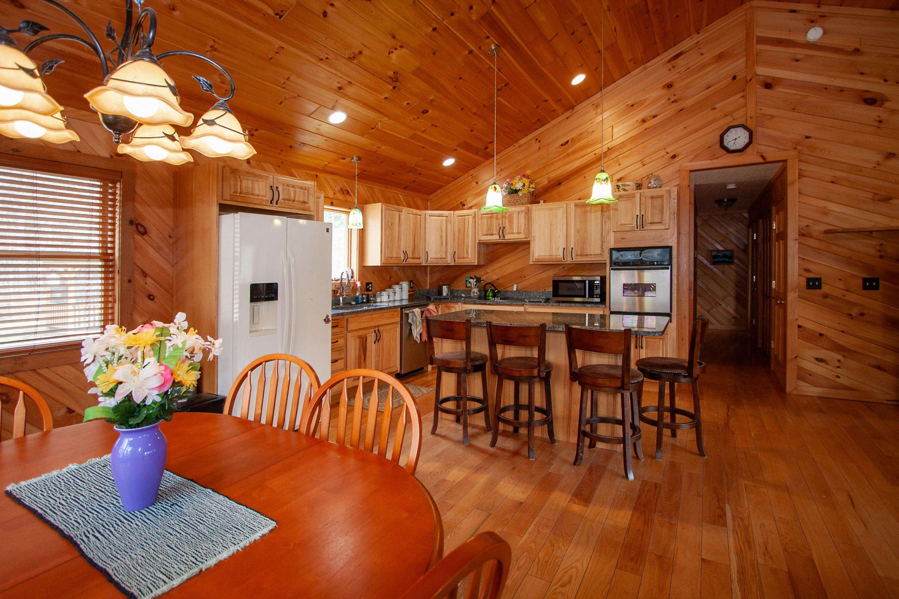 KITCHEN WITH GRANITE ISLAND
