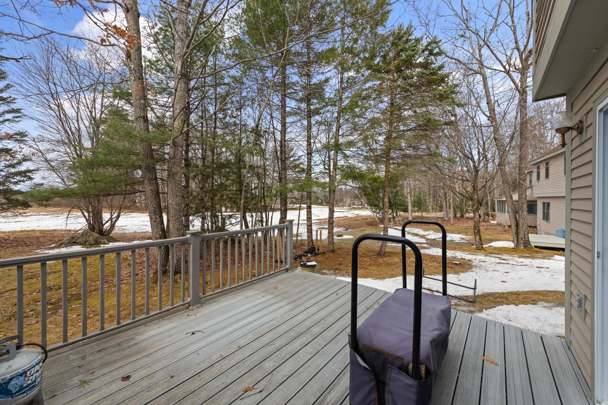 Your private back deck leads you to the rolling grass fields with a view!