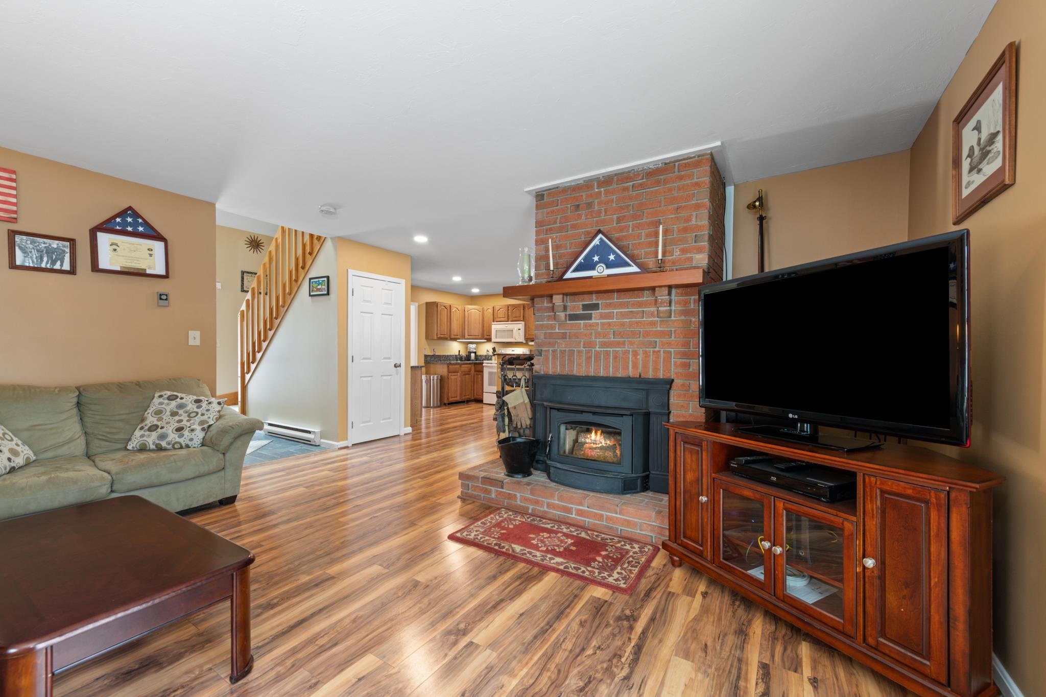 The living room even features a built in wood stove for those chilly nights