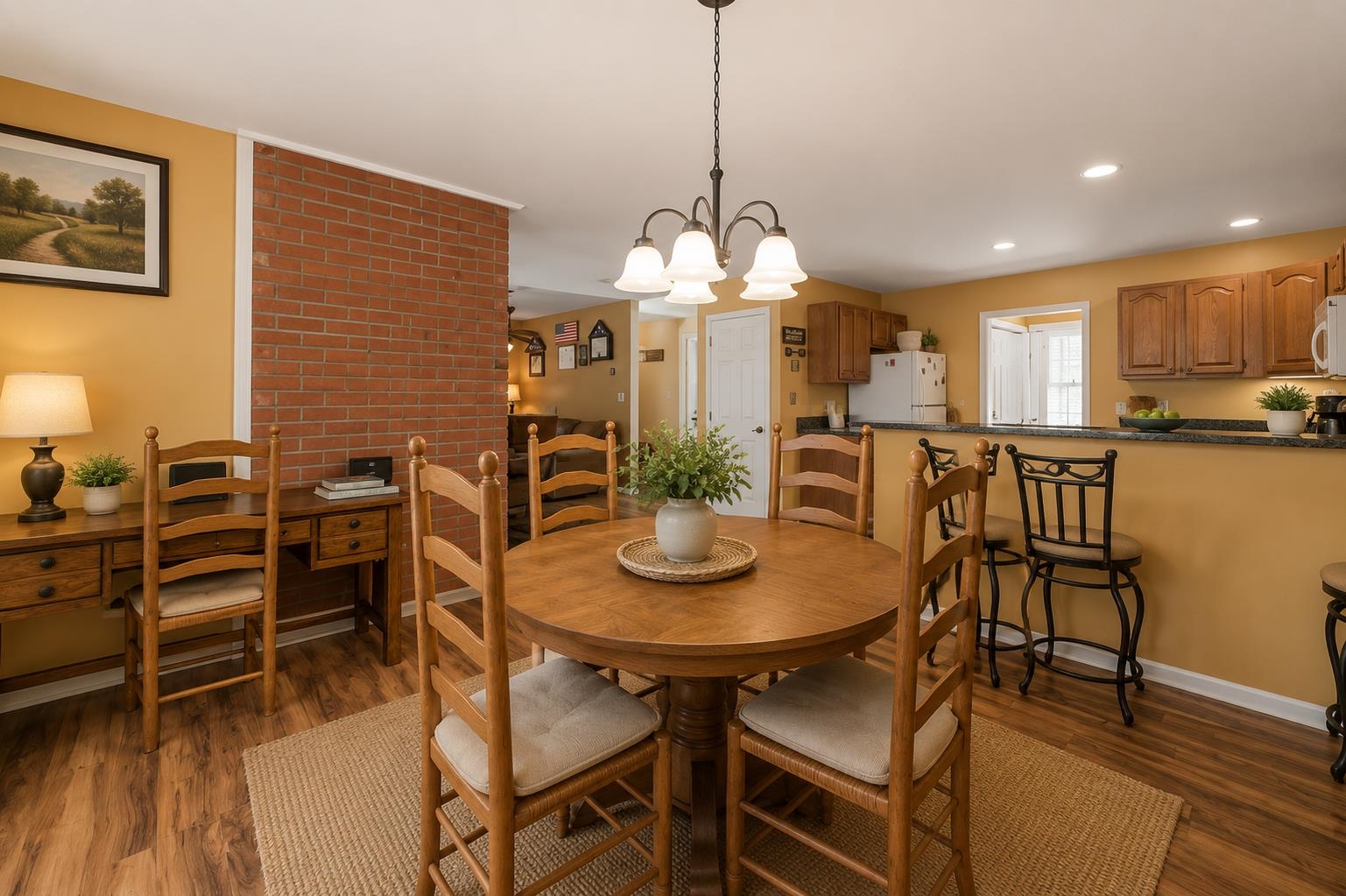 This dining room which sits right next to the kitchen for ease of entertaining