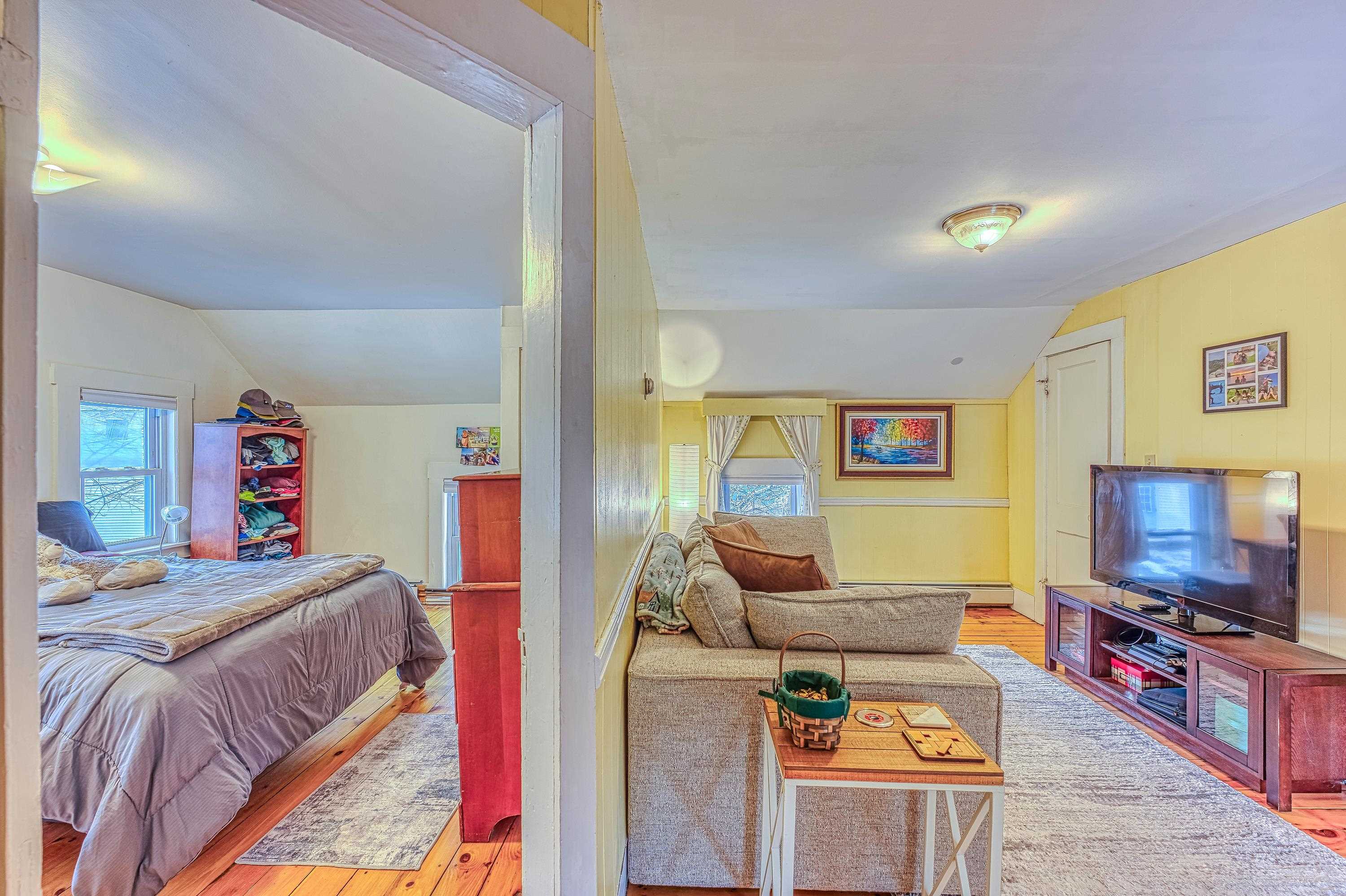 Unit A/1-Top of stairs bedroom and living room
