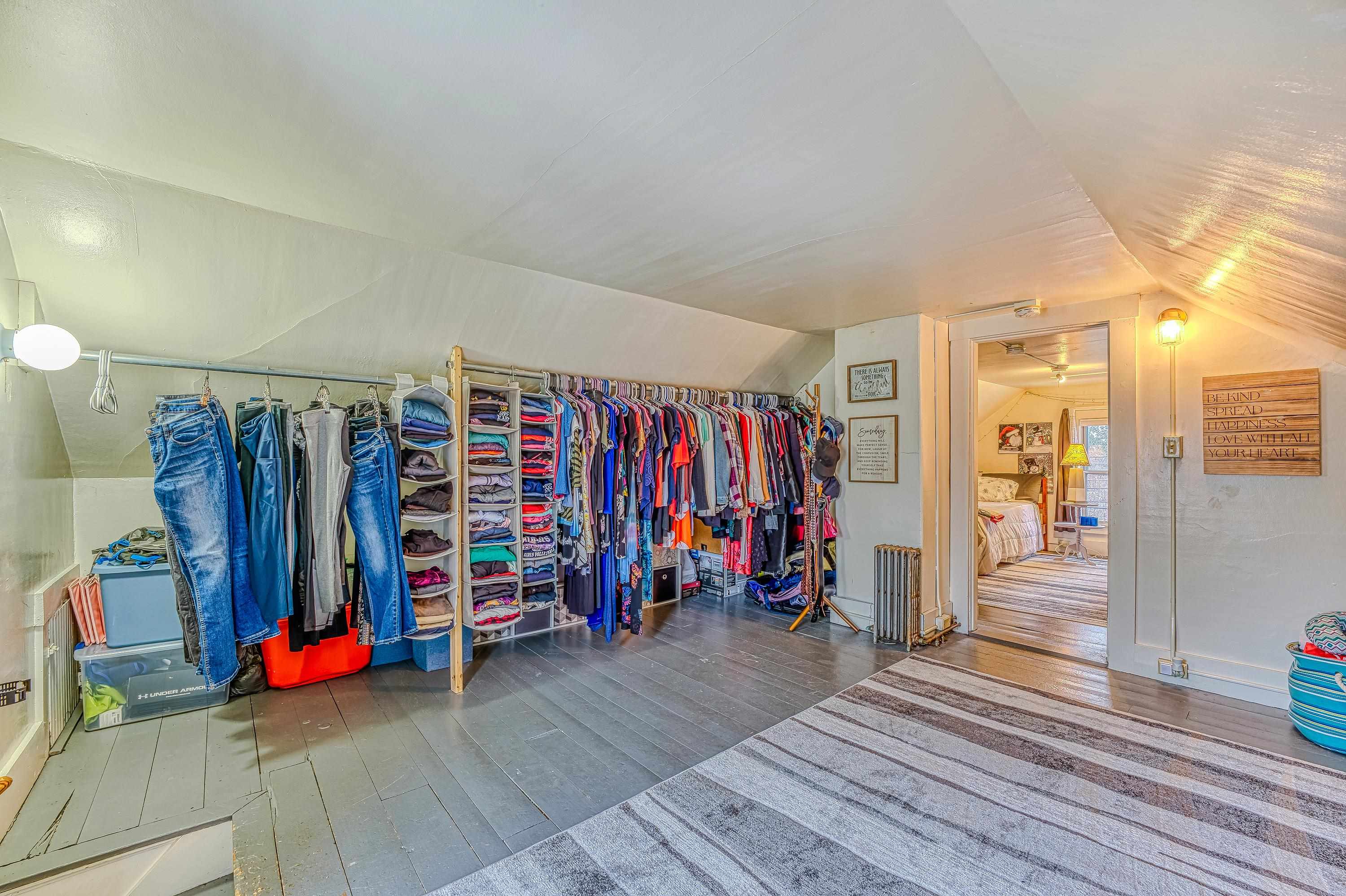 Unit A/1-walk through room to bedroom