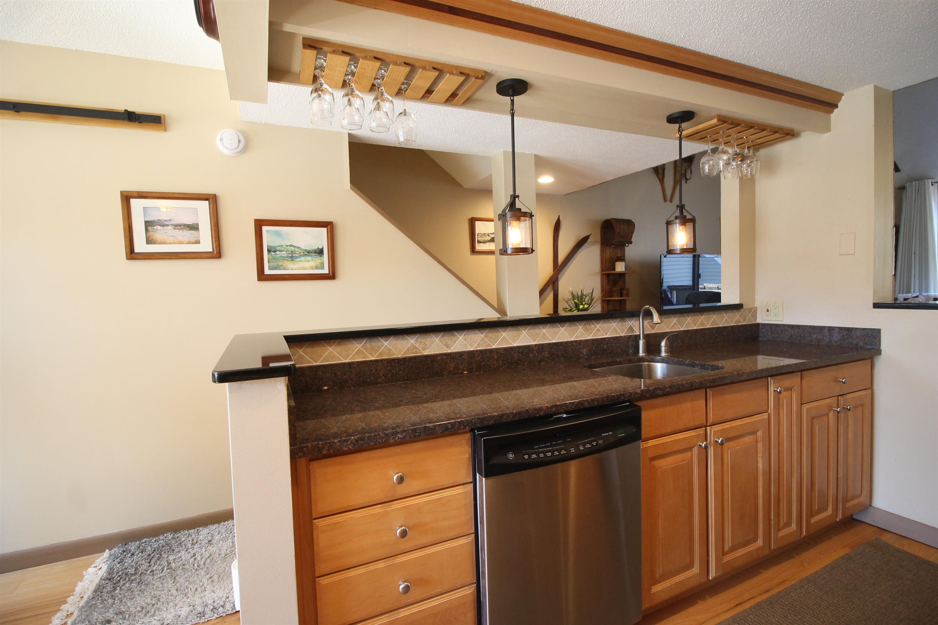 Renovated bar with added pendant lights
