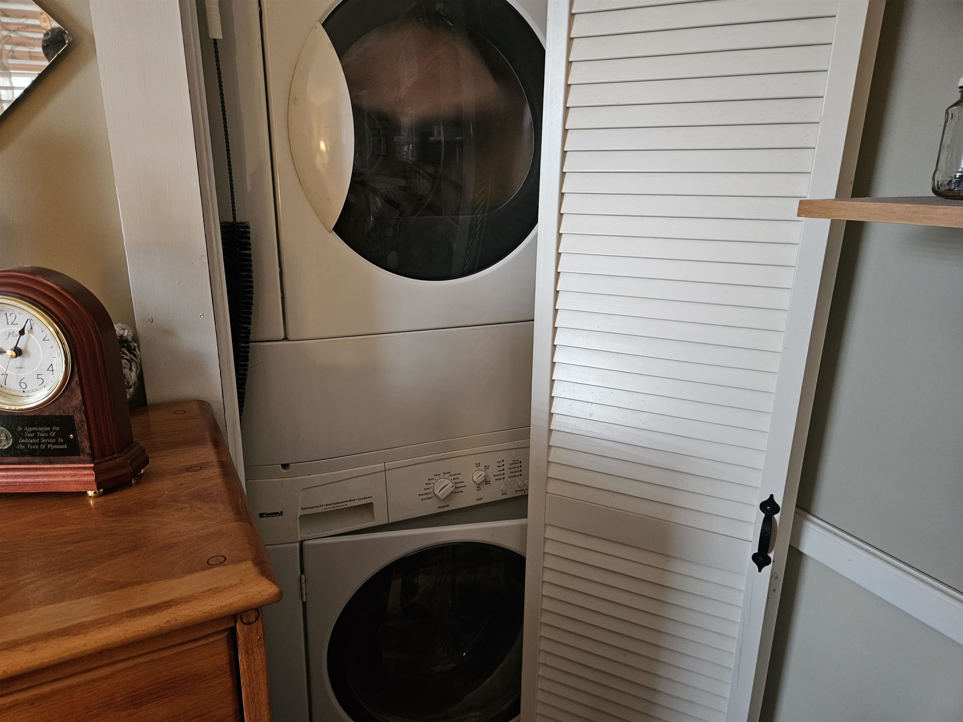 Stackable washer and dryer near 1/2 bath