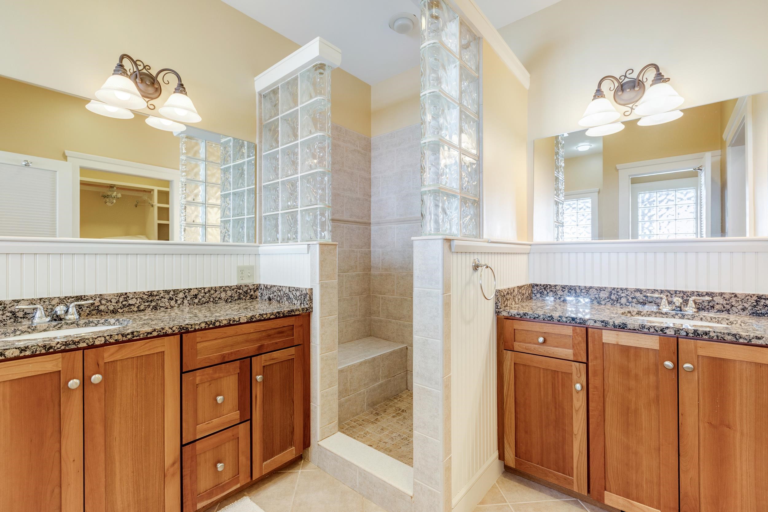 Dual Vanities and Custom Tiled Shower 24963608
