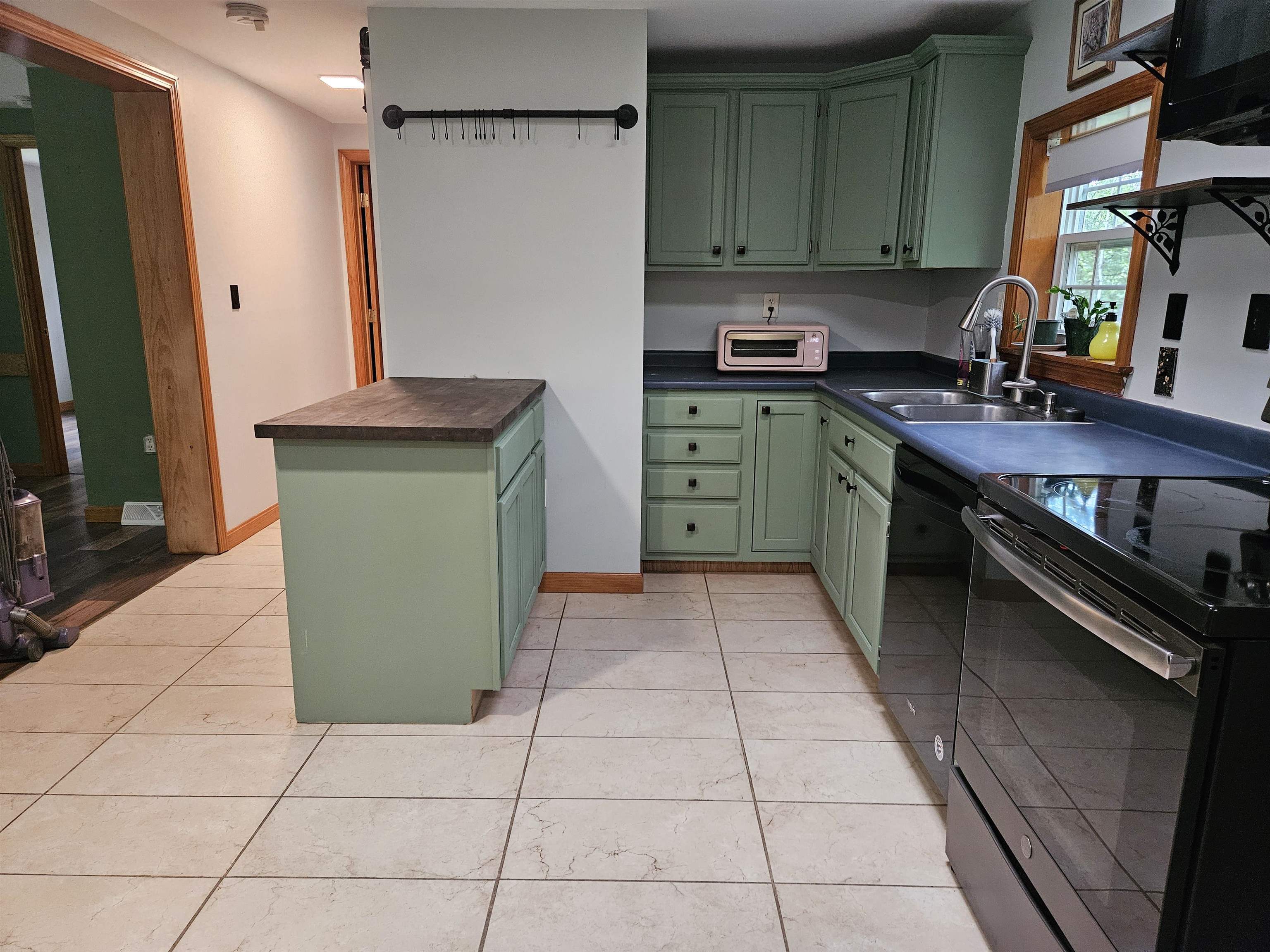 Kitchen from side entry hallway