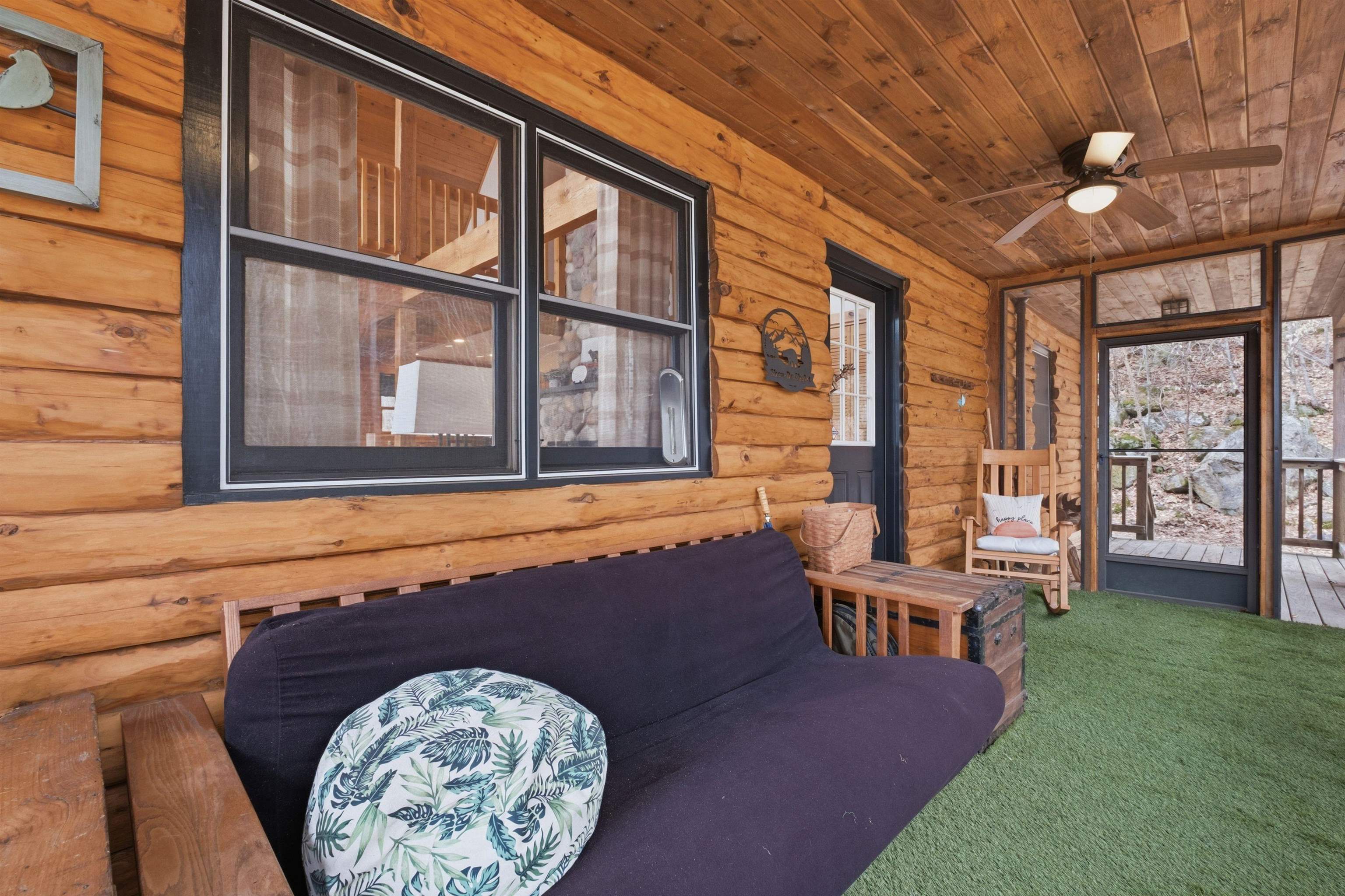 Screen Porch with two doors to the deck and driveway