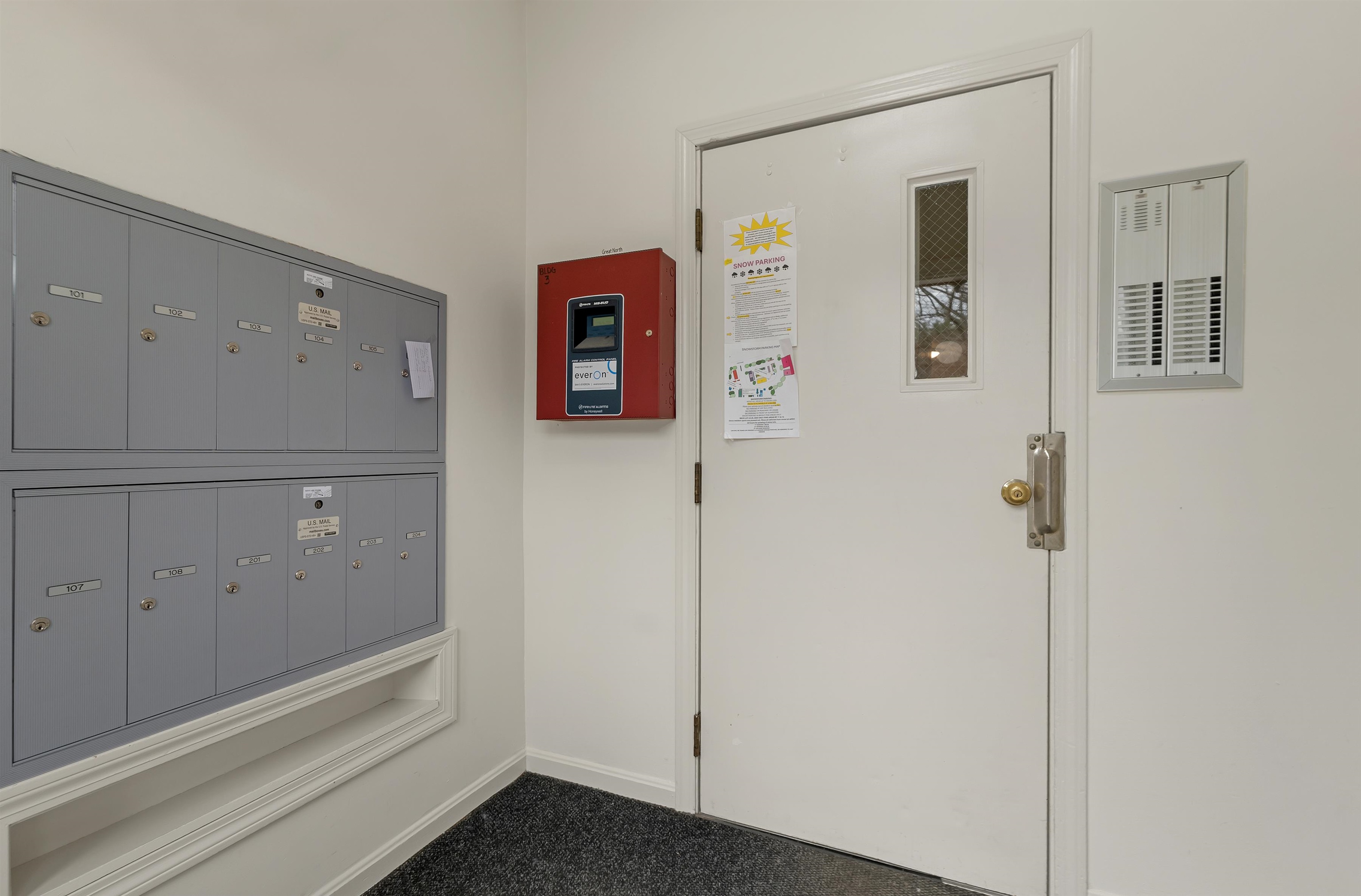 Secure entry to building w/easy access mail boxes