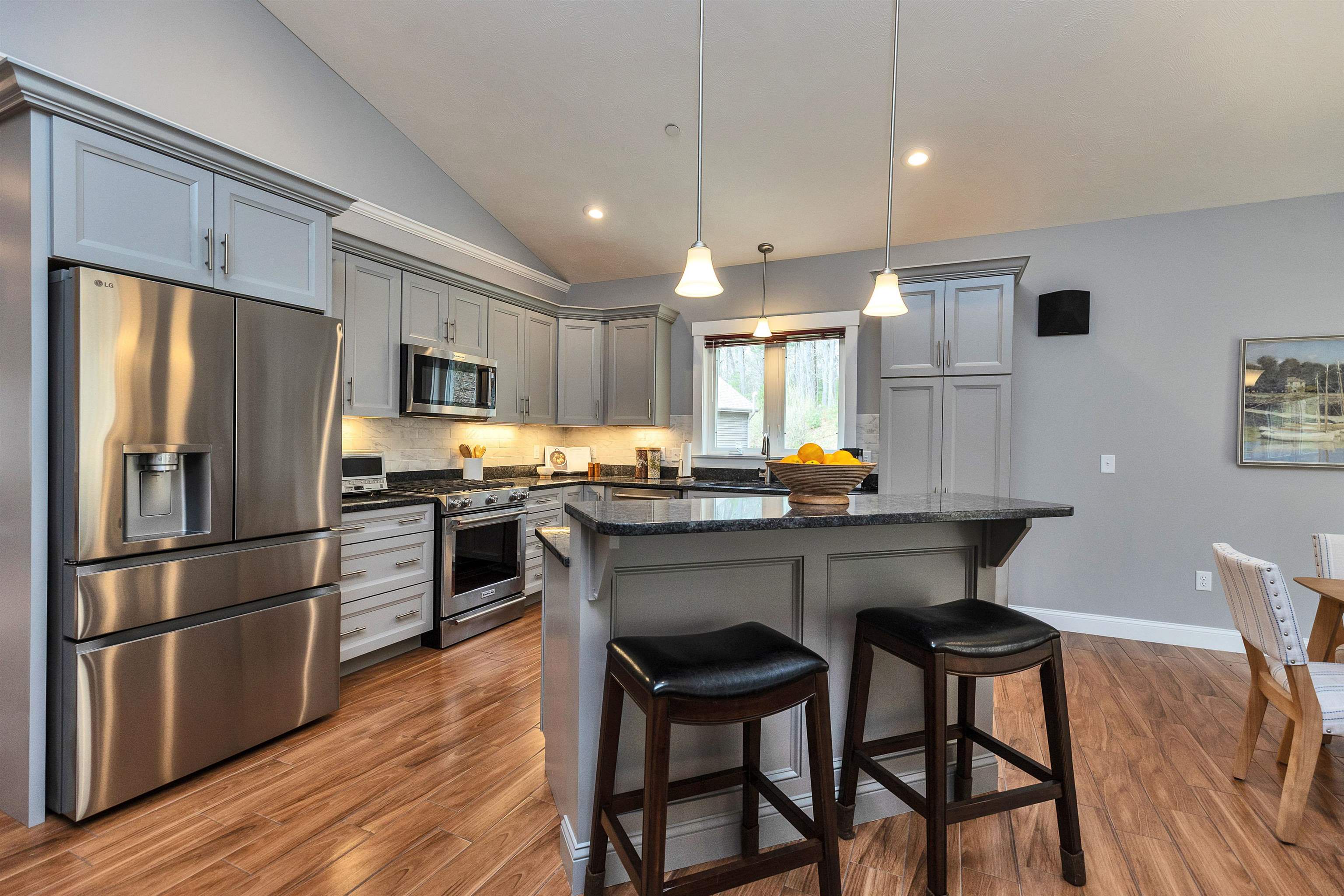 Granite island with seating�perfect for casual dining and entertaining.