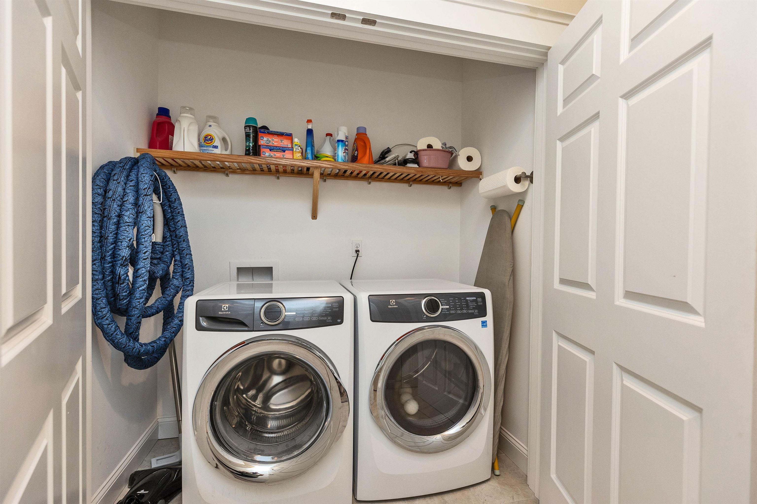 Mudroom with washer and dryer for everyday convenience.