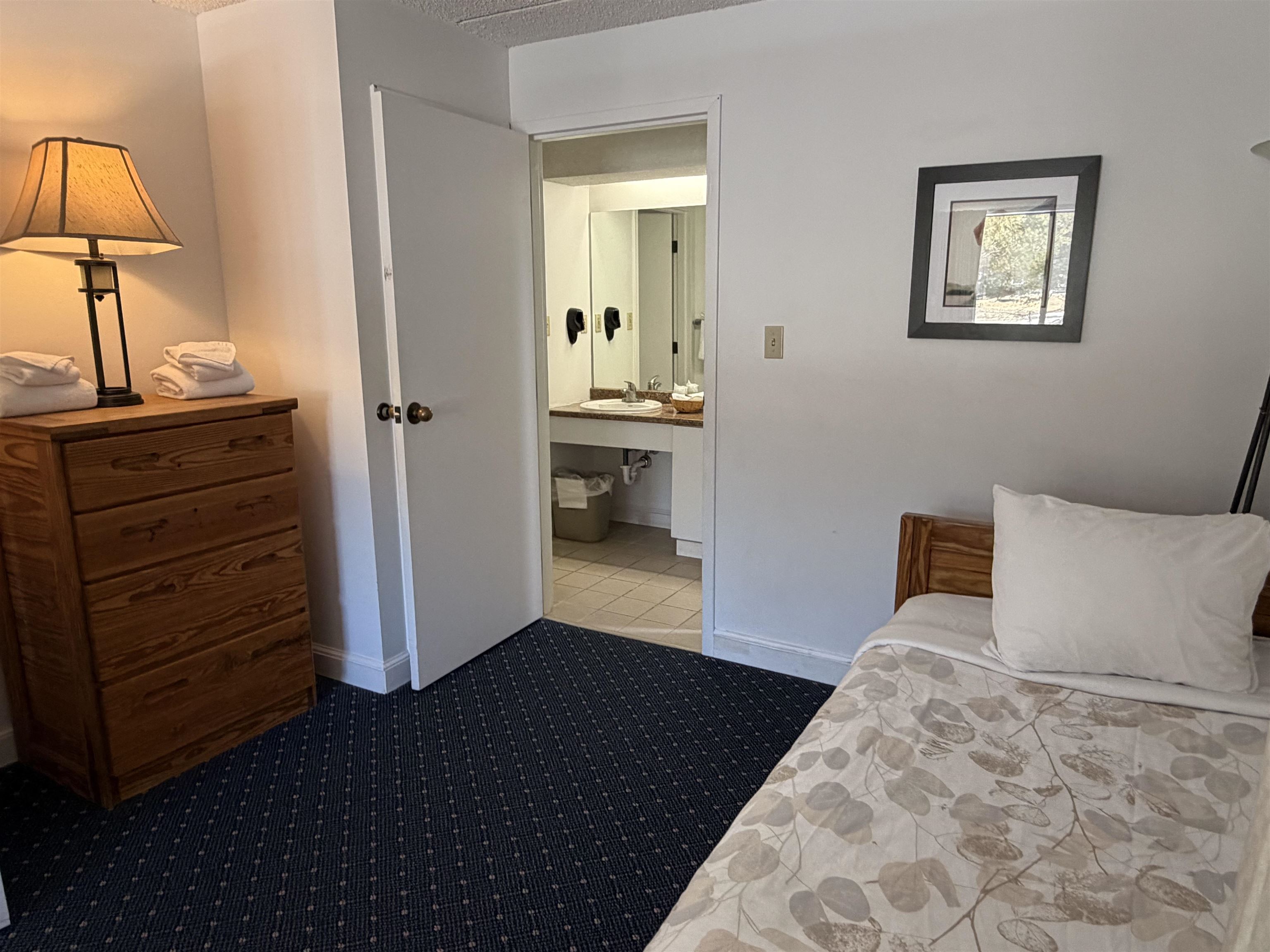 Adjacent to the bathroom