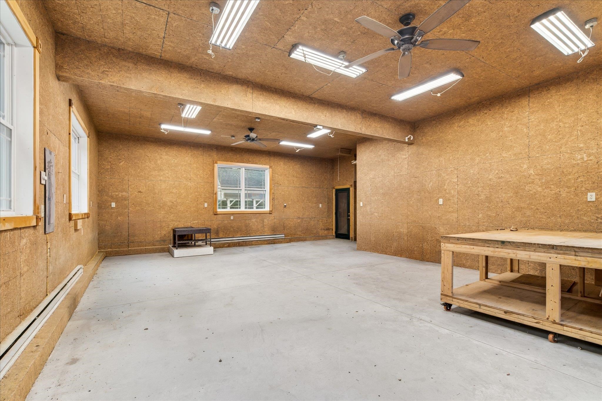 Large workshop with pellet stove insert and electicity