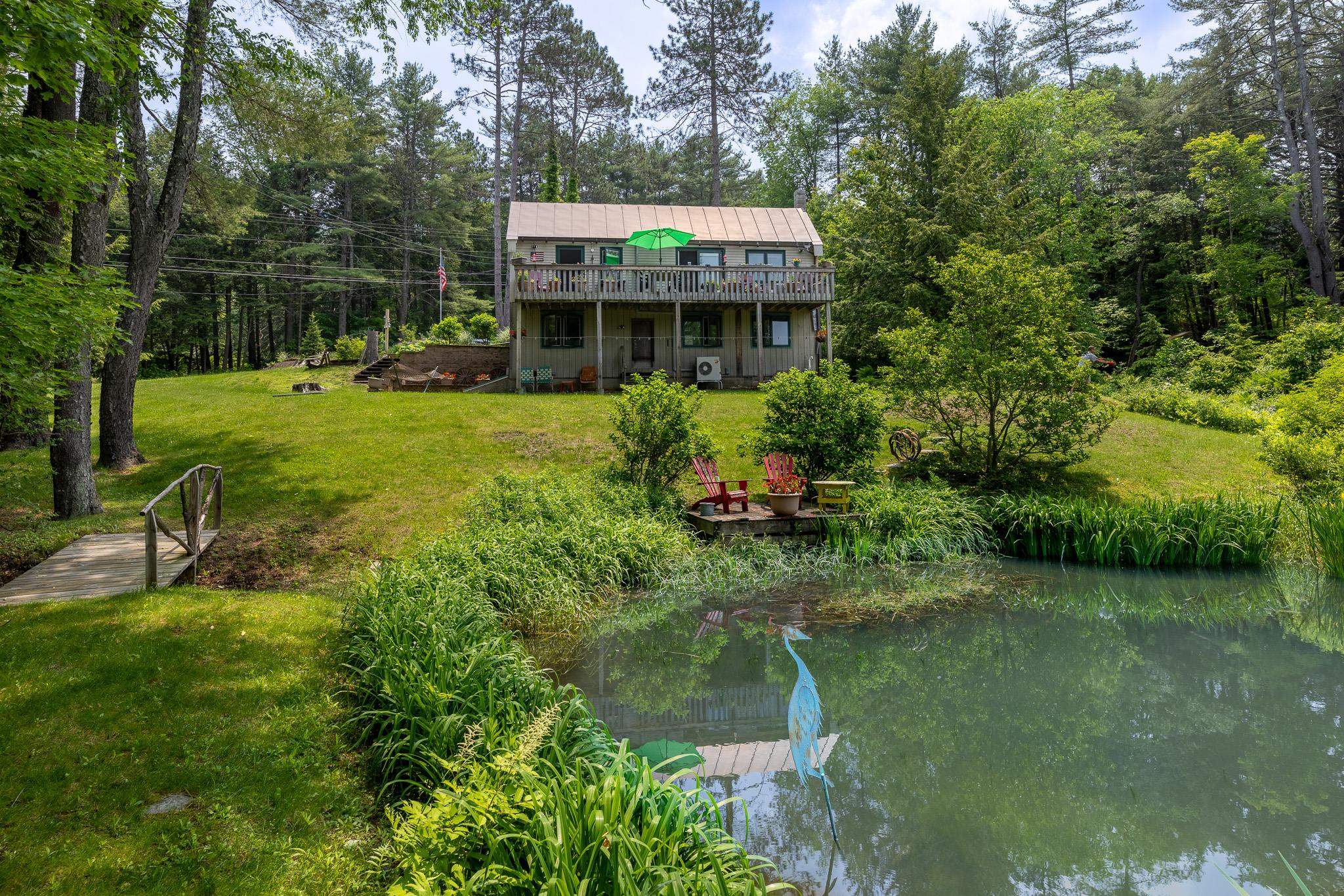 Back of house faces west. 25029755