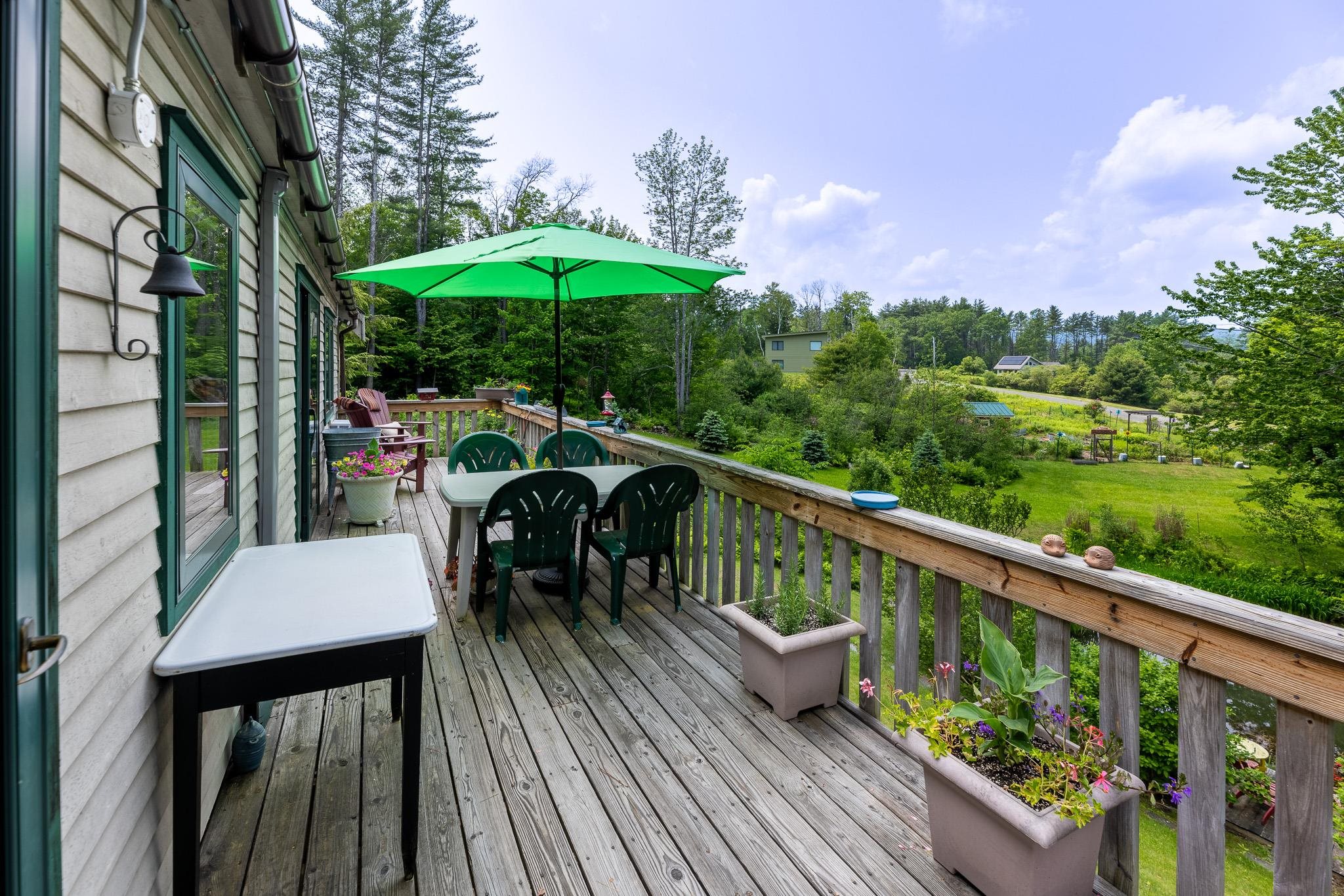 Rear deck accessed from Living Room & Kitchen. 25029756