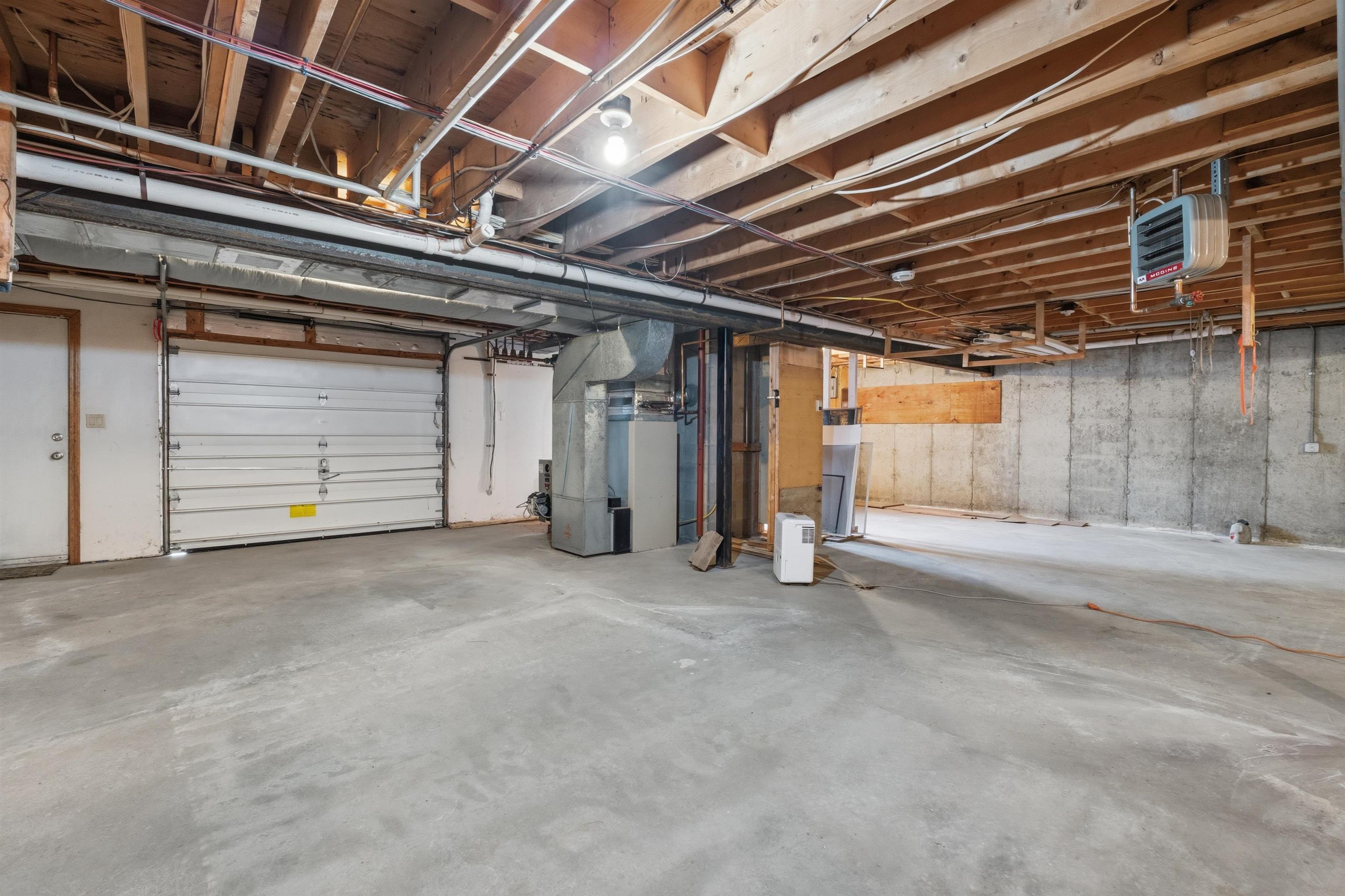 Heated Basement with Garage Door to Outside