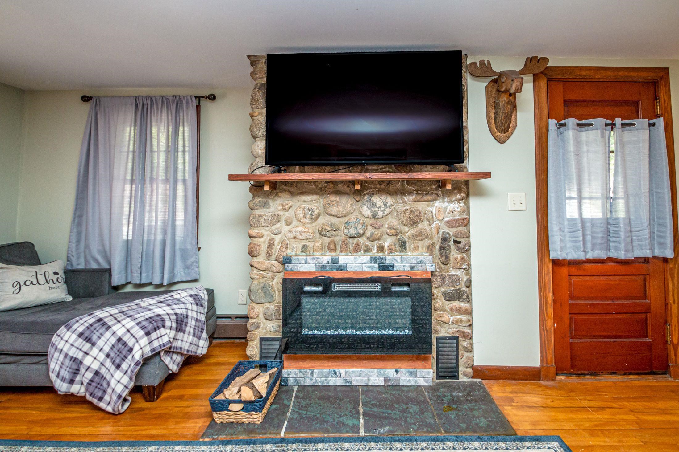 Handsome fieldstone fireplace