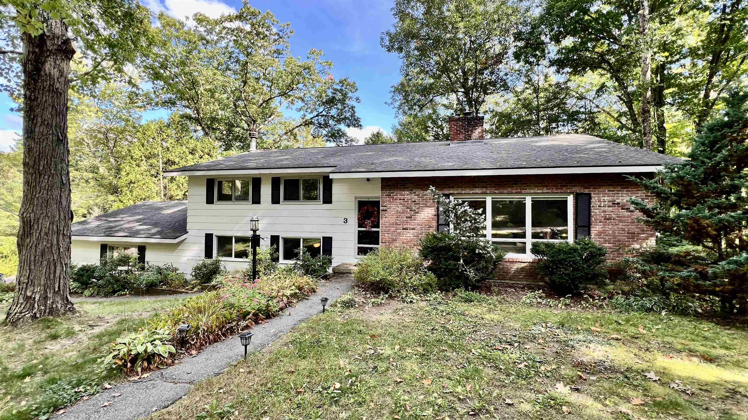 Rare 4 bedroom, 3 bath Pinewood Manor property in Essex designed for ordinary VT family living—inside and out.  This modern-meets-classic home has a 2300+ sqft layout to support your best VT life.  - Multiple spaces for privacy or gathering. This includes an extra large 19 x 14 living room with fireplace, and a sun-filled, eat-in kitchen with new wood flooring, granite and tile countertops, and three walls of custom maple cabinetry. The eat-in kitchen is large enough for casual meals, homework, and morning routines. A formal dining room supports your formal events. - The comfy living room is enormous, supporting movies, gaming and reading at once, with built in shelves and a fireplace. Off the front door is a large office with built-ins, a fireplace and French doors, for a classic work space to get things done.  - Daily routines are smooth with direct entry from the garage into a mudroom/laundry area with a ¾ bath— an ideal landing for Vermont seasons, gear, and busy households. Use the front door for your more ceremonial guests. Upstairs, four bedrooms with closets provide nice flexibility for growing families, guests or hobbies. This home offers two primary bedroom options, one with a Juliet balcony at the back, the other with a full ensuite bathroom, facing the street. - Outside a tranquil yard and low-slung deck sits on .58 acres. This sun-dappled area is made for play, pets, and gatherings, and offers a partial fence.  Under a mature tree canopy, this property has just enough yard to not become a chore, but you will probably want a leaf-blower for the Fall. - Located in a long established, wooded neighborhood known for a strong sense of community, you’ll enjoy walking trails, pool membership option, seasonal events, playgroups, and more— neighbors connect! - Updates include a new kitchen floor and interior paint.  Minutes to Global Foundries, Essex 5 corners. Being sold "As-is".  Open House! Saturday 4/25, 10am-1pm