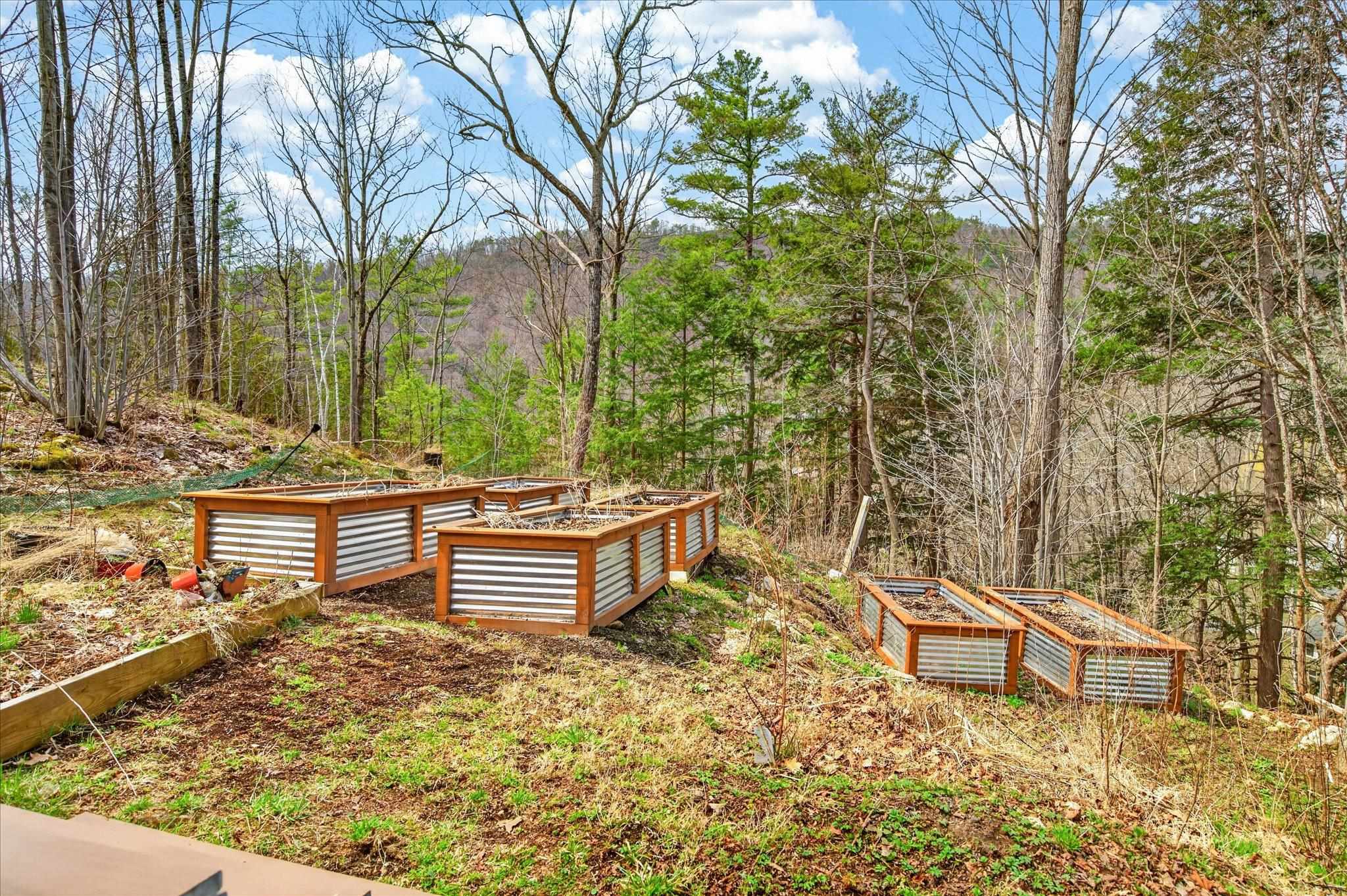 Raised beds are not included but help with garden visual location