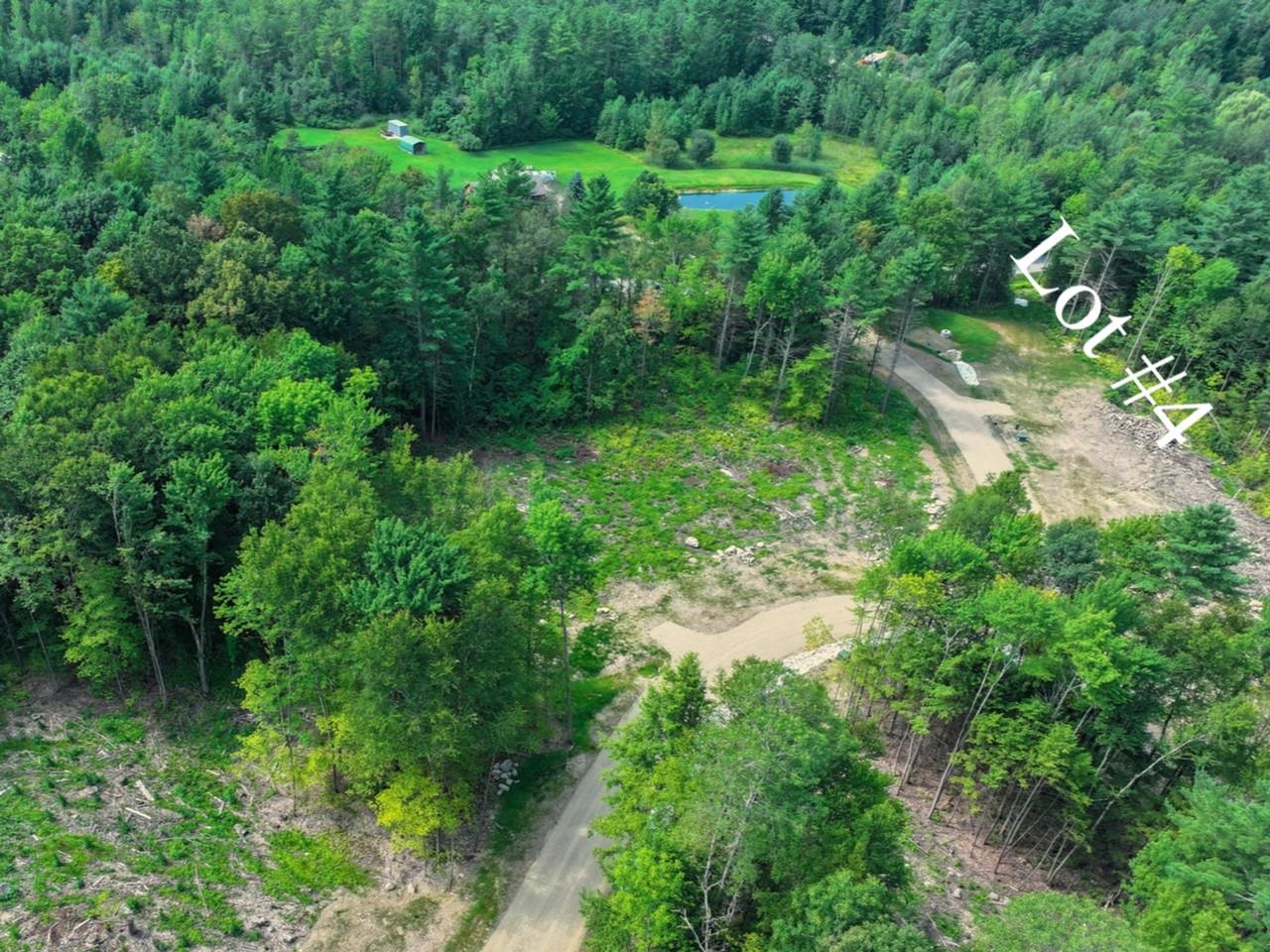 3.68 acres w/hardwood border