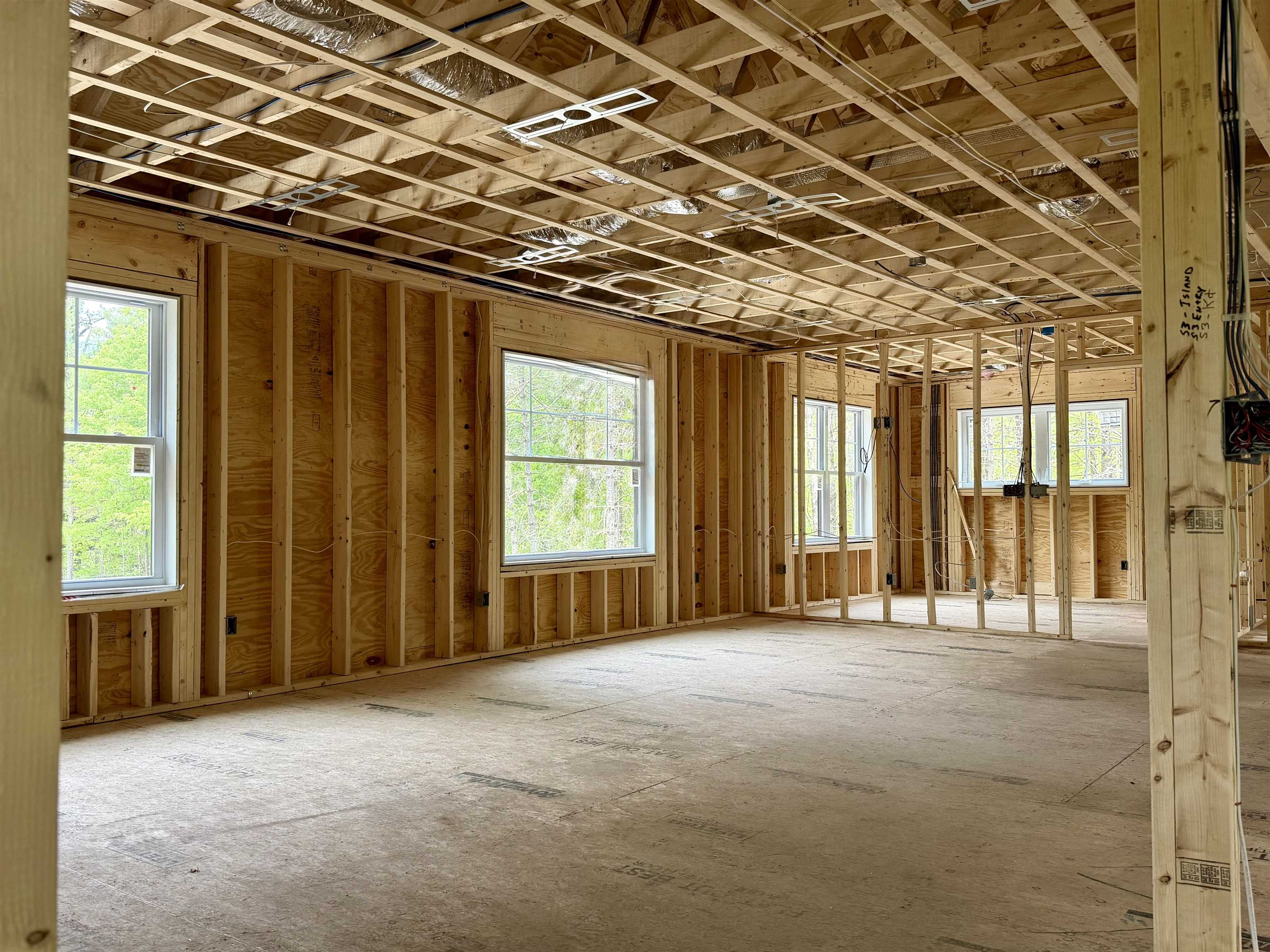 View of living space from coming up the stairs