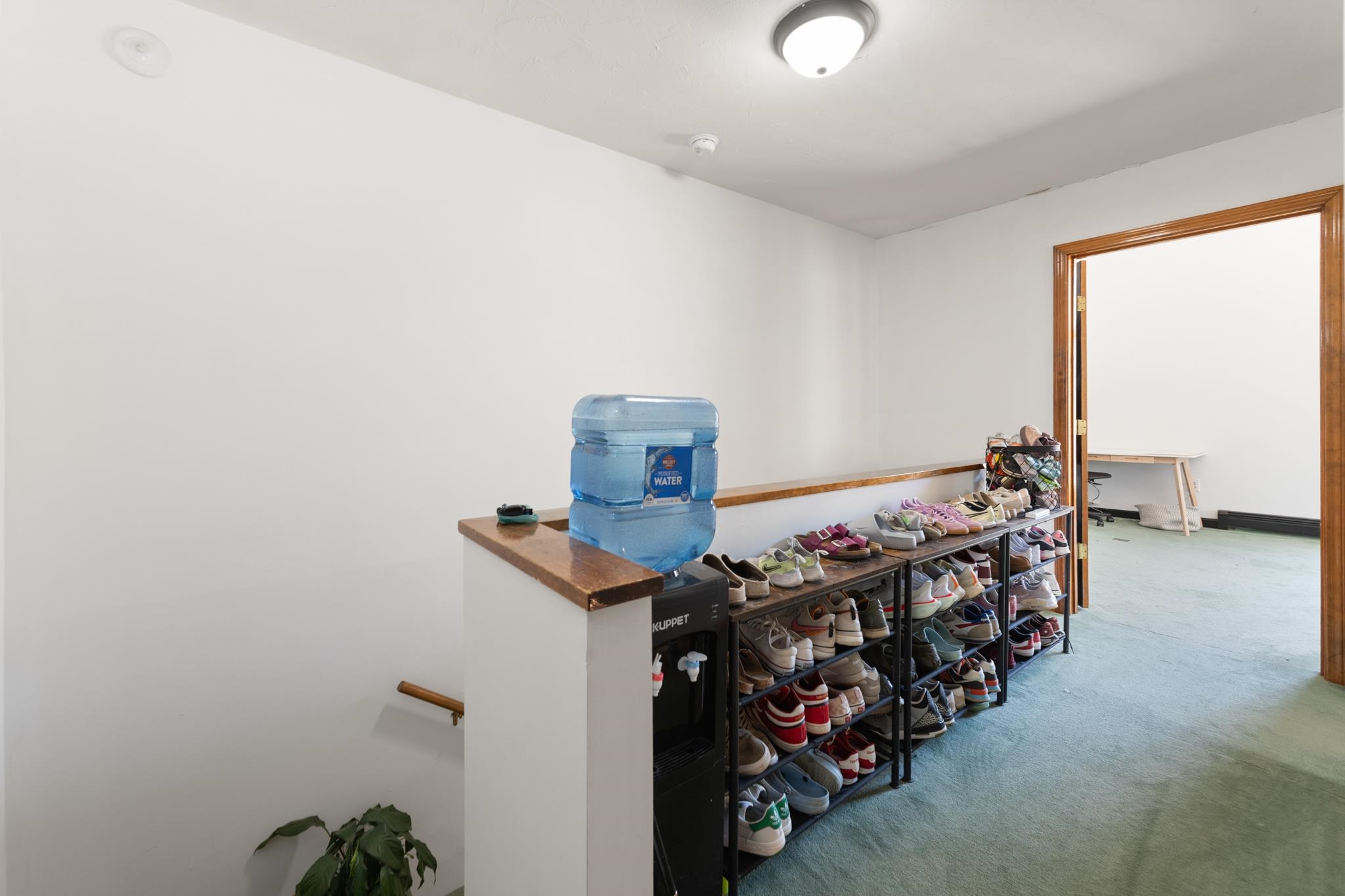 At the top of the stairs opens up to the two units