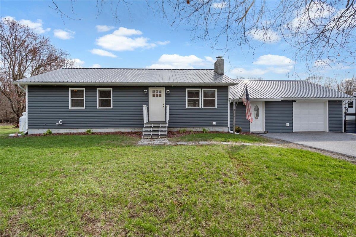 Don't miss out on this well maintained 3-bedroom ranch with attached 1 car garage on .86 acres of land.  The kitchen features stainless steel appliances, and a stylish tile backsplash, with a slider leading to a sunny back yard—ideal for grilling and relaxing in the Gazebo.  All bedrooms offering soft carpeted floors with plenty of natural light. Just minutes away from local amenities, schools, parks, and shopping centers, making this location both convenient and desirable.