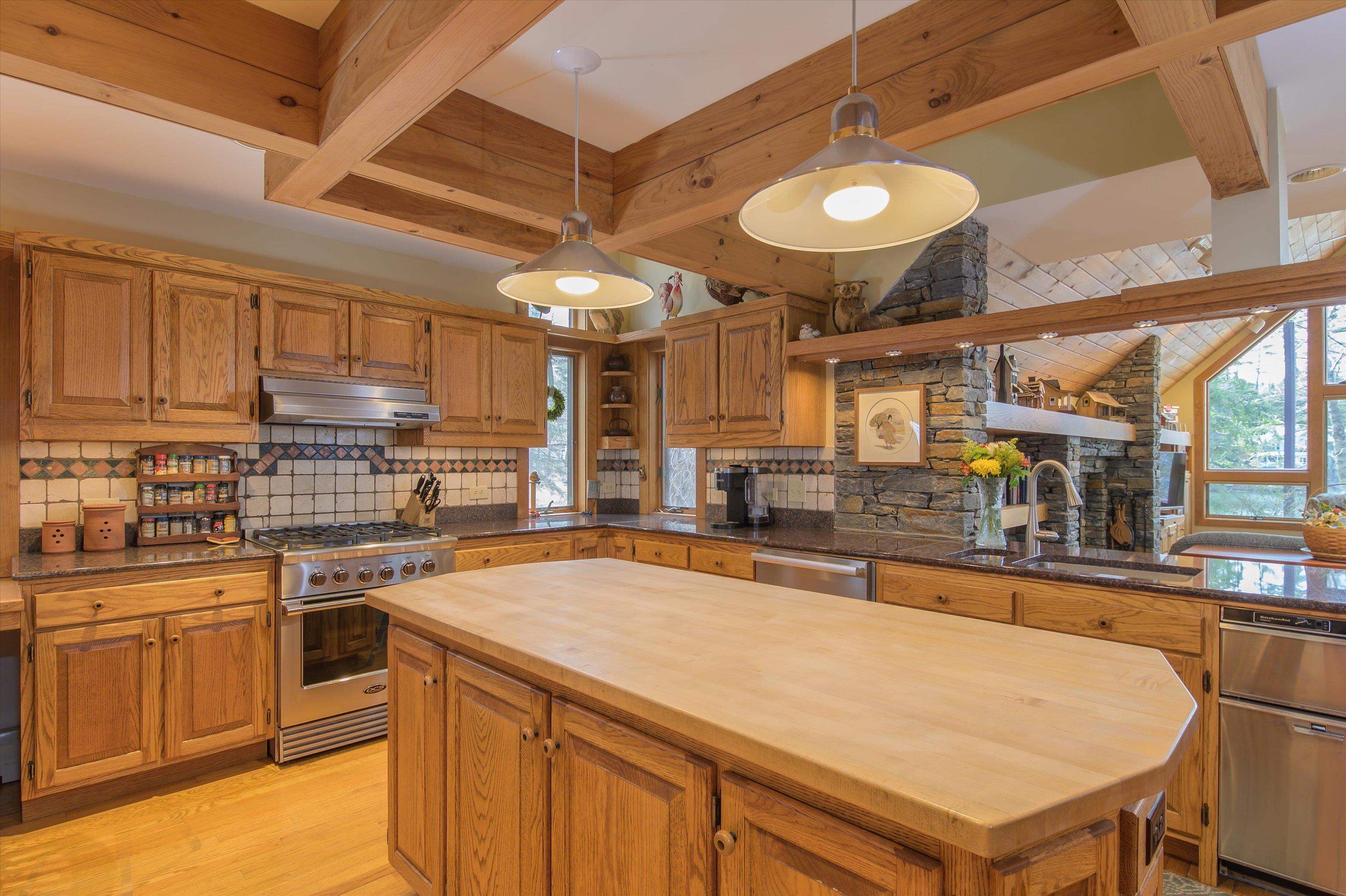 With Butcher Block and Granite Countertops
