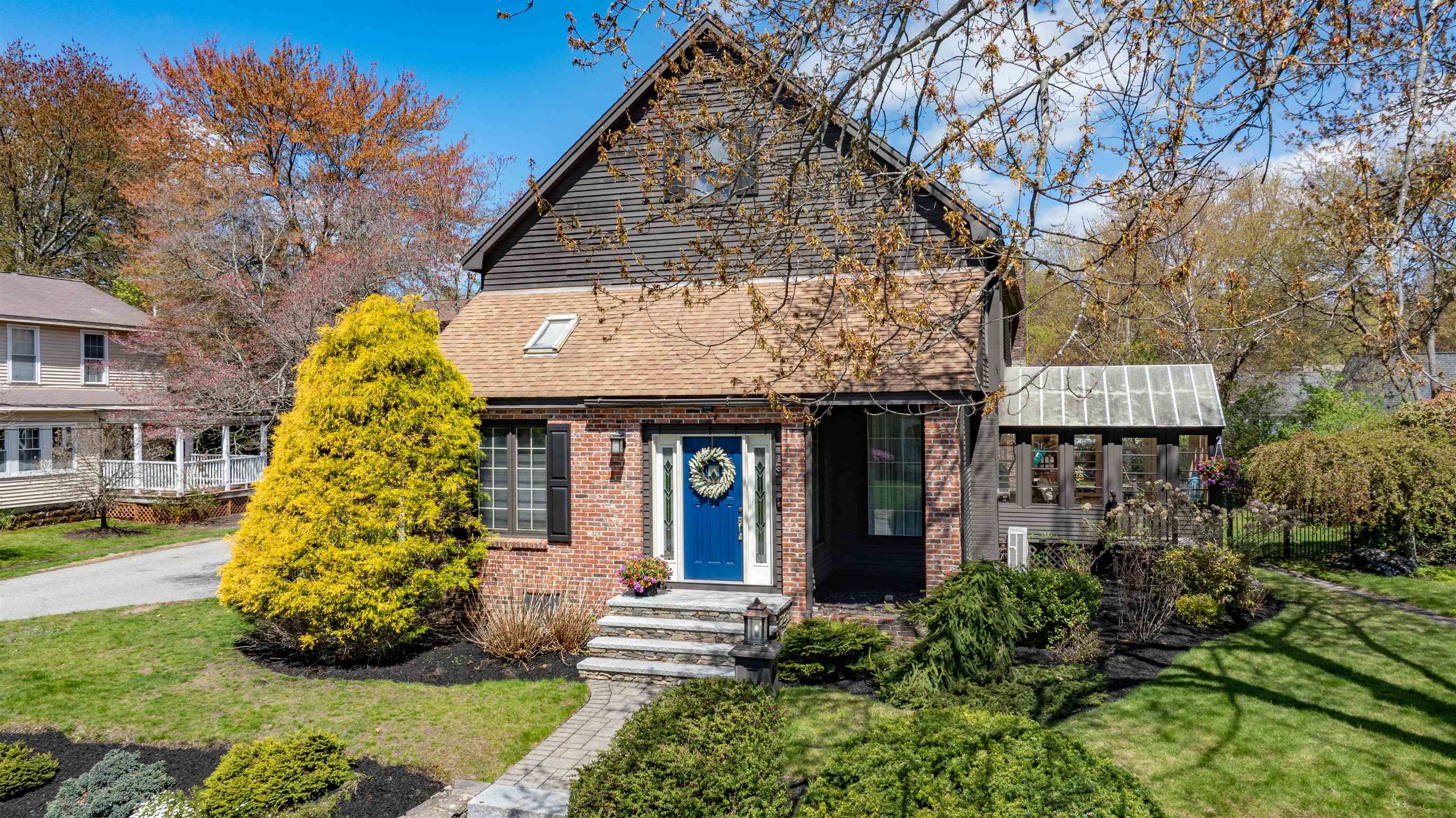 A rare gem in the heart of North Nashua, this beautifully updated Colonial blends timeless elegance with modern luxury in one of the area’s most sought-after locations. From the moment you arrive, the custom granite stairway and inviting front entry set the tone for a home that has been lovingly curated and meticulously maintained. Inside, sunlight dances across refinished tile flooring and gleaming hardwoods, while the renovated kitchen shines with updated cabinetry, designer lighting, and premium appliances—creating the perfect backdrop for everyday living and unforgettable gatherings alike. The extraordinary primary suite is a true private retreat, featuring a spa-inspired bath completely transformed with custom tilework, a luxurious freestanding soaking tub, oversized shower, elegant vanity towers, updated lighting, and a spacious walk-in closet designed for comfort and serenity. Beautifully renovated guest and powder baths continue the home’s refined style with thoughtful updates throughout. Freshly repainted in 2024, every room feels bright, warm, and welcoming. The expansive lower level offers exceptional flexibility with a guest suite ideal for extended family or private accommodations. A stunning family room with new hardwood flooring seamlessly complements the kitchen and gathering spaces above. Outside, the magic continues. The fully fenced yard creates a peaceful sanctuary for pets, play, and outdoor entertaining, while the recently replaced irrigation system keeps the grounds lush and vibrant. Car enthusiasts, hobbyists, and creatives will appreciate the oversized garage spaces with abundant loft and walk-up storage—perfect for a studio, workshop, or future expansion. Every inch of this exceptional home reflects pride of ownership, thoughtful upgrades, and enduring charm. For added peace of mind, this home comes with a 1 year home warranty policy. Opportunities like this are truly rare.