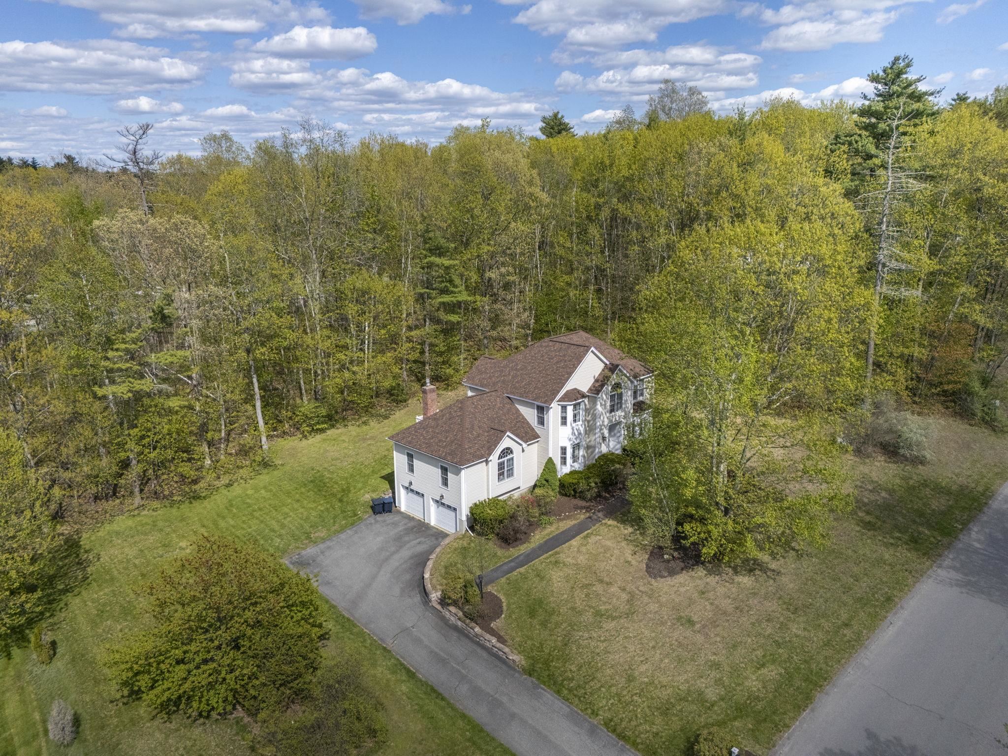 Presenting 25 Squire Armour in beautiful Windham, New Hampshire. This four bedroom home offers the perfect combination of space, updates, and an unbeatable location. Just a short walk to Griffin Park, the property provides easy access to recreation, schools, shopping, and major commuting routes. Inside, the spacious layout is ideal for both everyday living and entertaining. The enormous family room flows seamlessly into the kitchen, creating the perfect gathering space for holidays, game days, or relaxed nights at home. A first floor office makes working from home both comfortable and convenient. The primary bedroom features a private bath and walk in closet, while three additional bedrooms provide flexibility for family, guests, or extra workspace. Recent major updates offer peace of mind, including a roof replaced in 2024 and two brand new furnaces installed in May 2026. The partially finished basement adds valuable additional living space with endless possibilities for a playroom, gym, or media room. Outside, enjoy the privacy of the backyard setting and the welcoming outdoor space. This is a wonderful opportunity to own a move in ready home in one of Southern New Hampshire’s most desirable communities. Showings begin Saturday, May 16th. Welcome home!