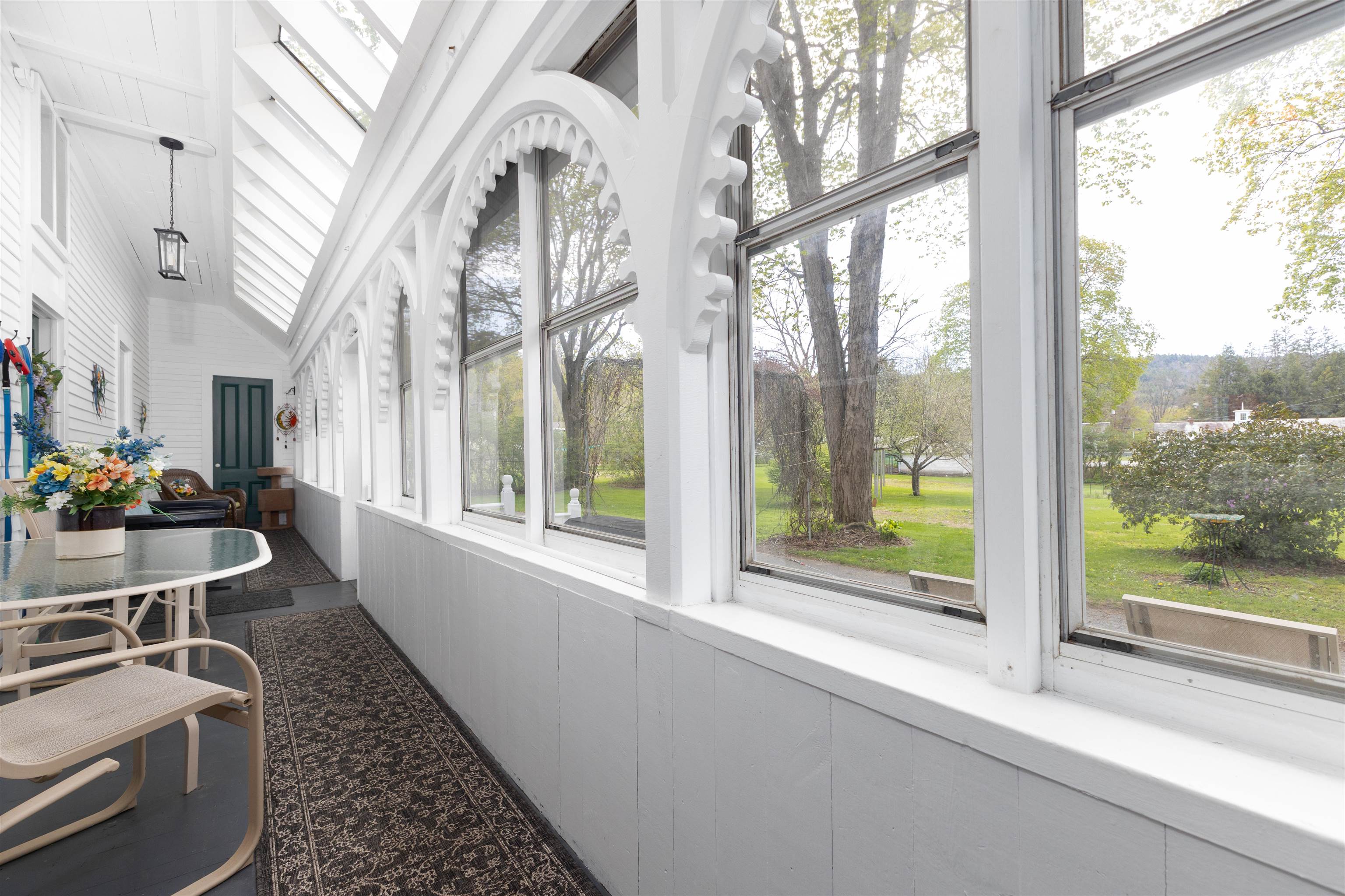 Arched windows of the back porch, beautiful back yard 25198553