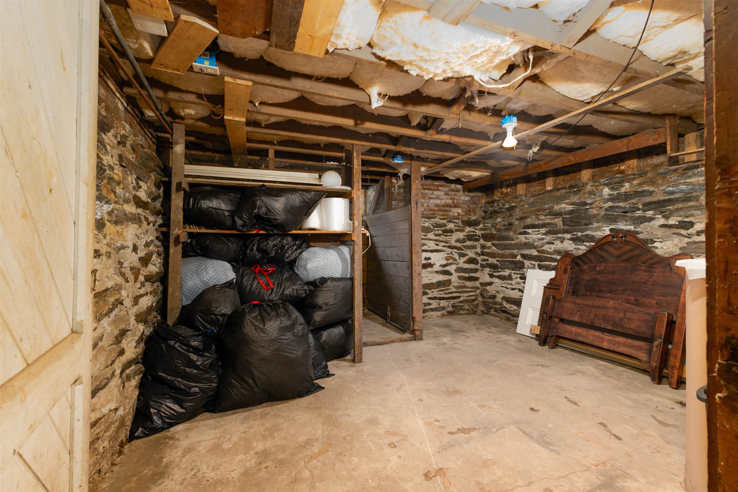 basement on left side of the home, door steps to outside 25198557