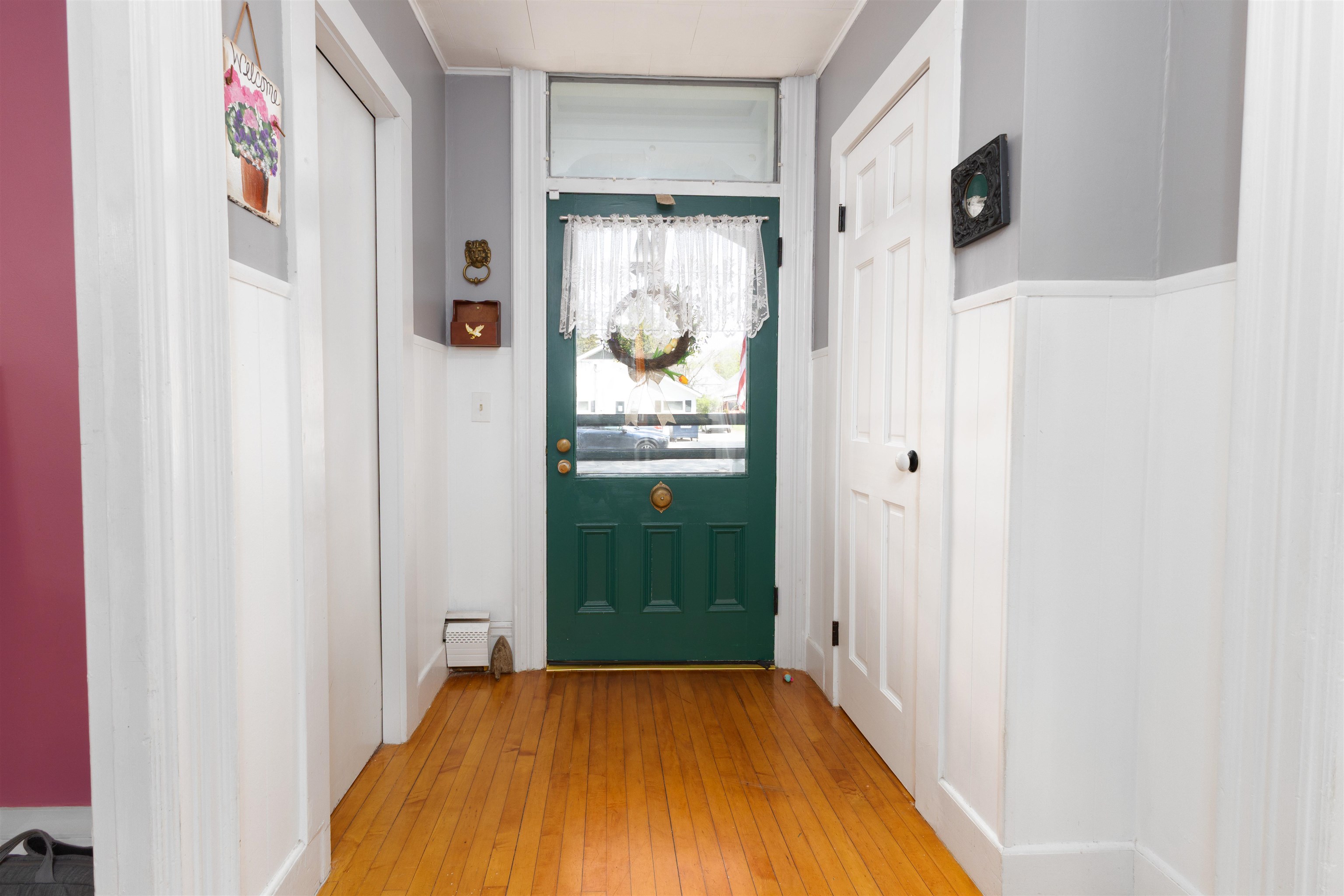 Front entrance 1/4 bath on right, coat closet on the left 25198571