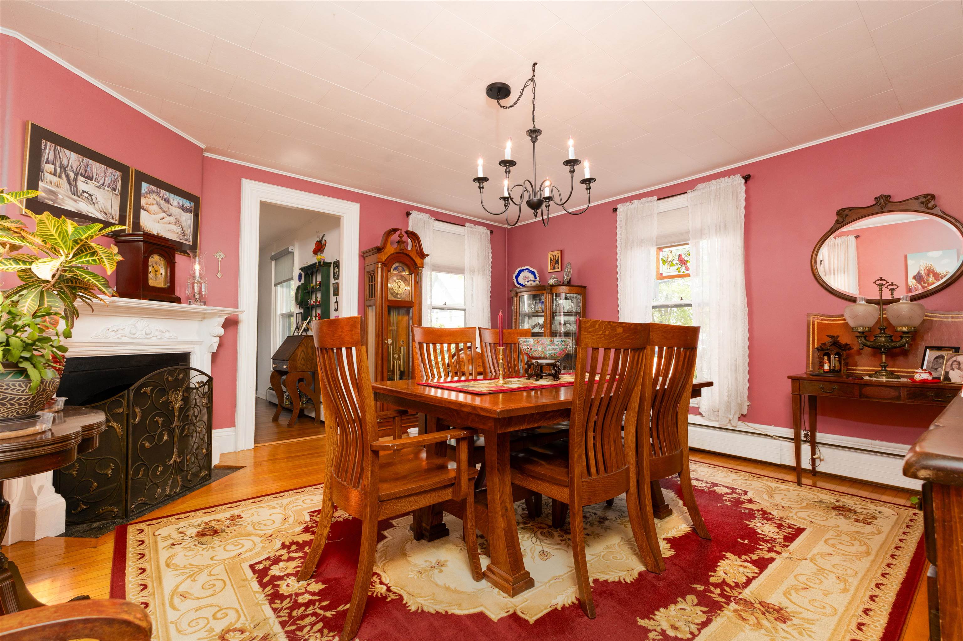 Dining room Decorative fireplace connects to kitchen 25198574