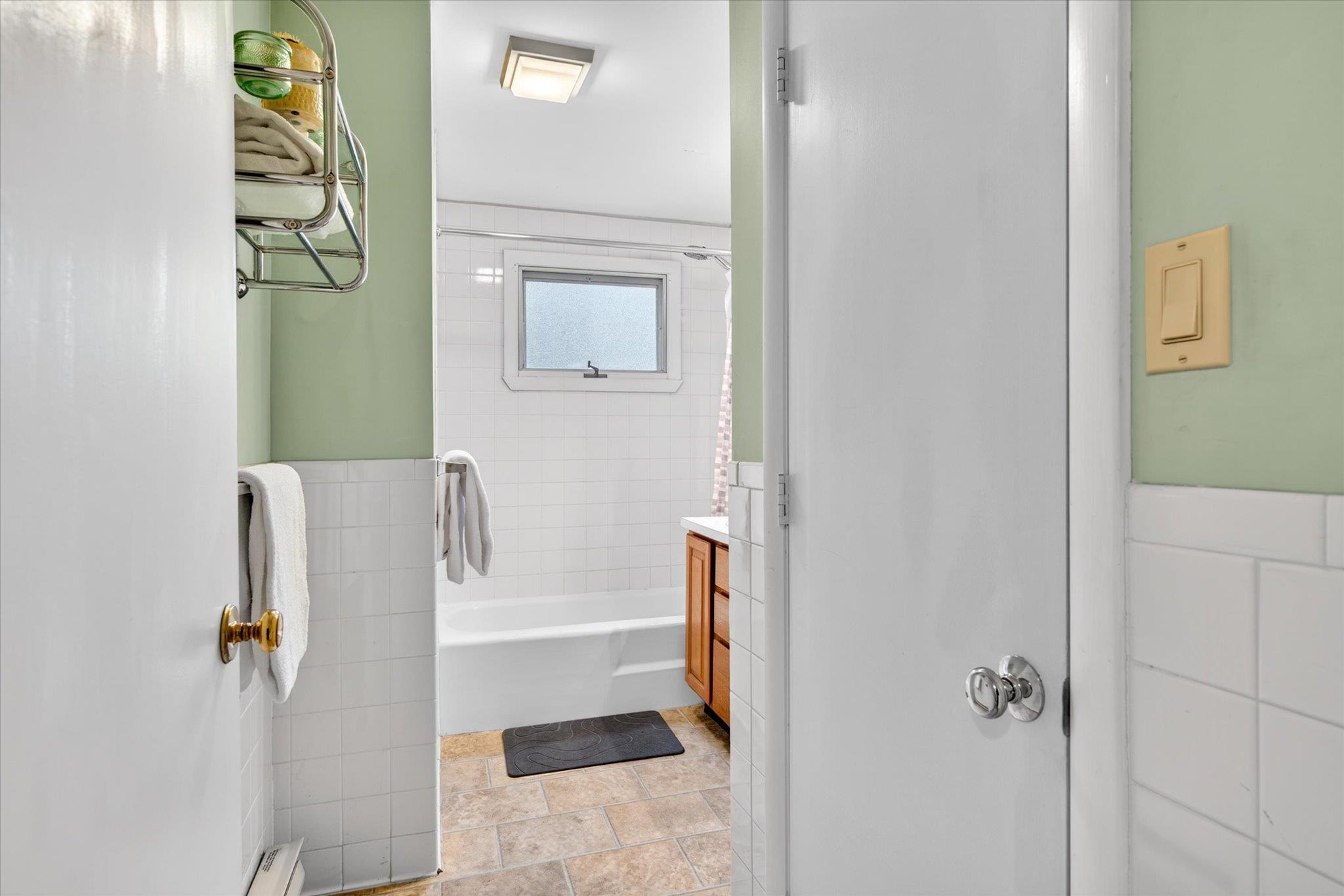 full bath with tub