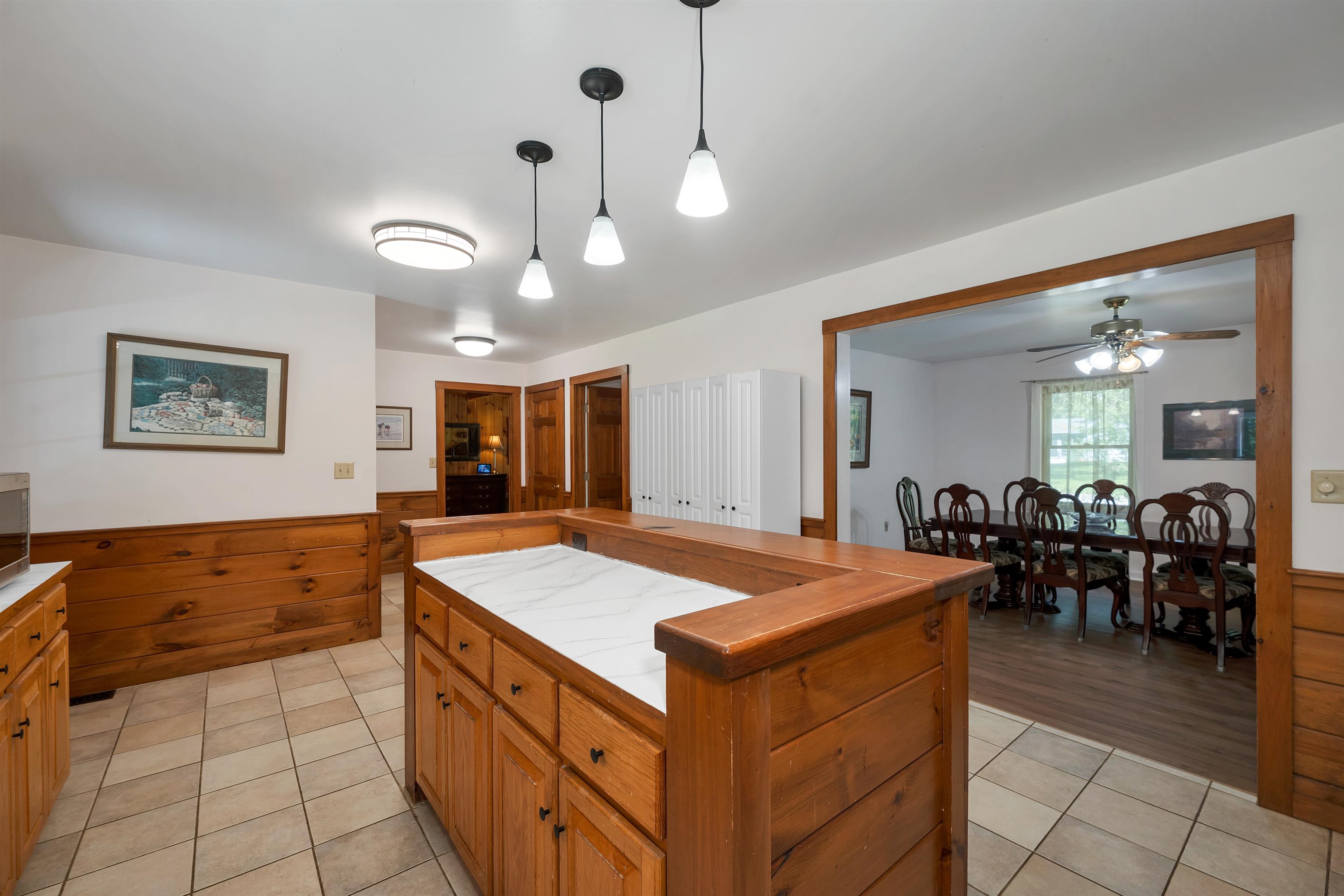 Open flow between kitchen and dining for easy entertaining.