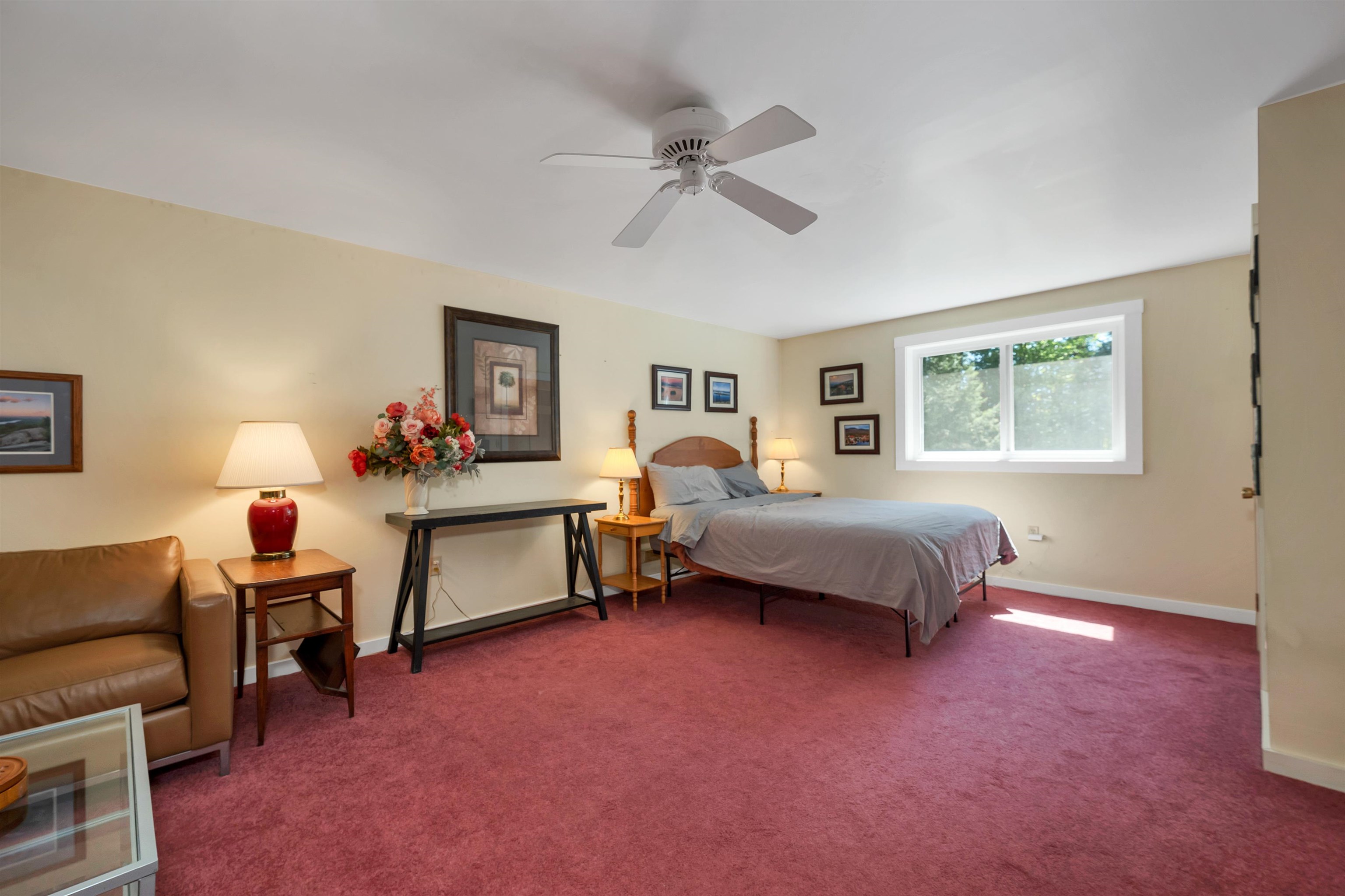 A spacious bedroom with natural light and comfortable proportions.