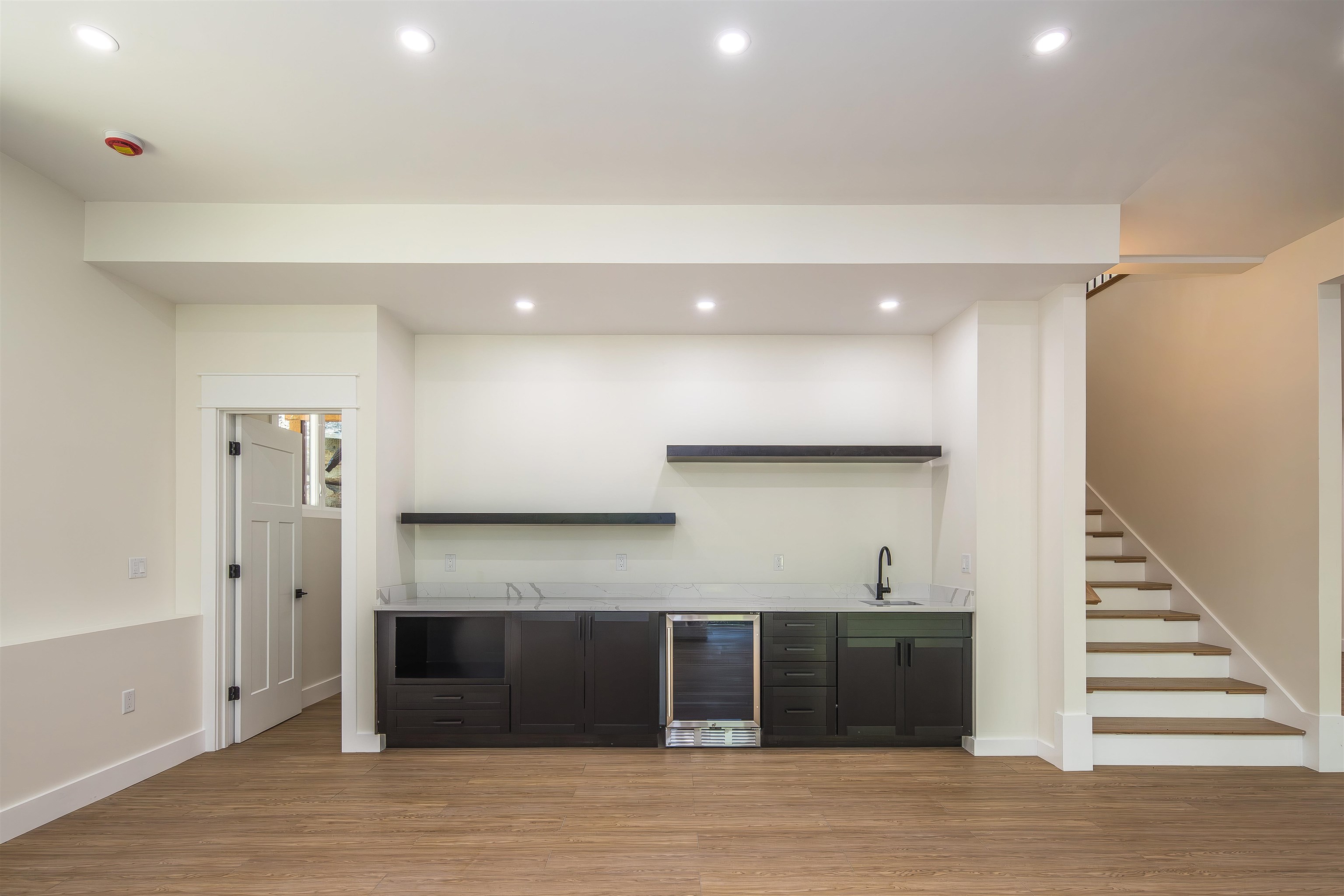 Custom we bar area with mini fridge and storage 25524705