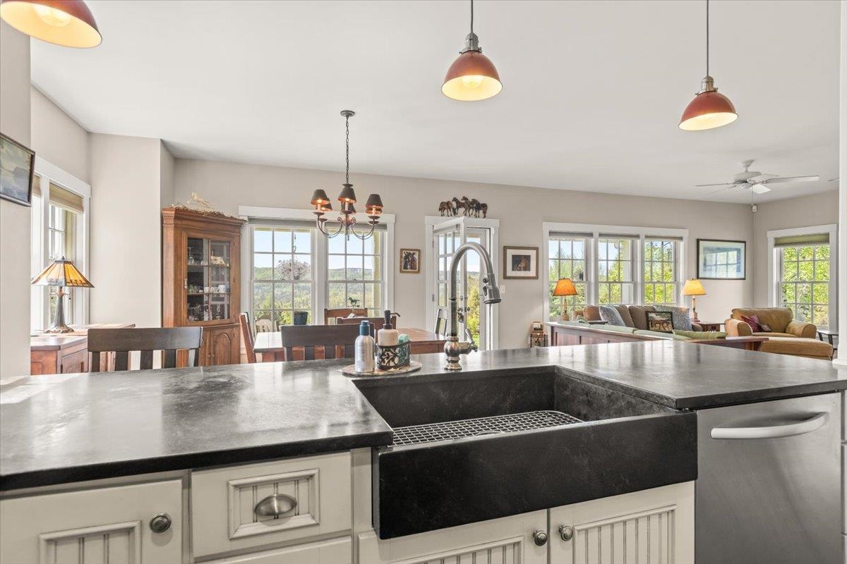 Breakfast bar, open floor plan to dining room/living room