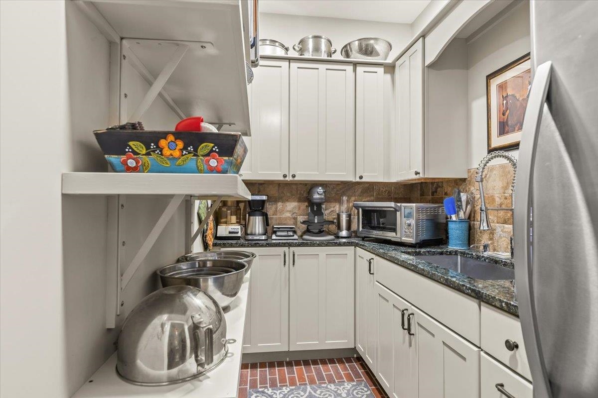 large pantry room with second fridge