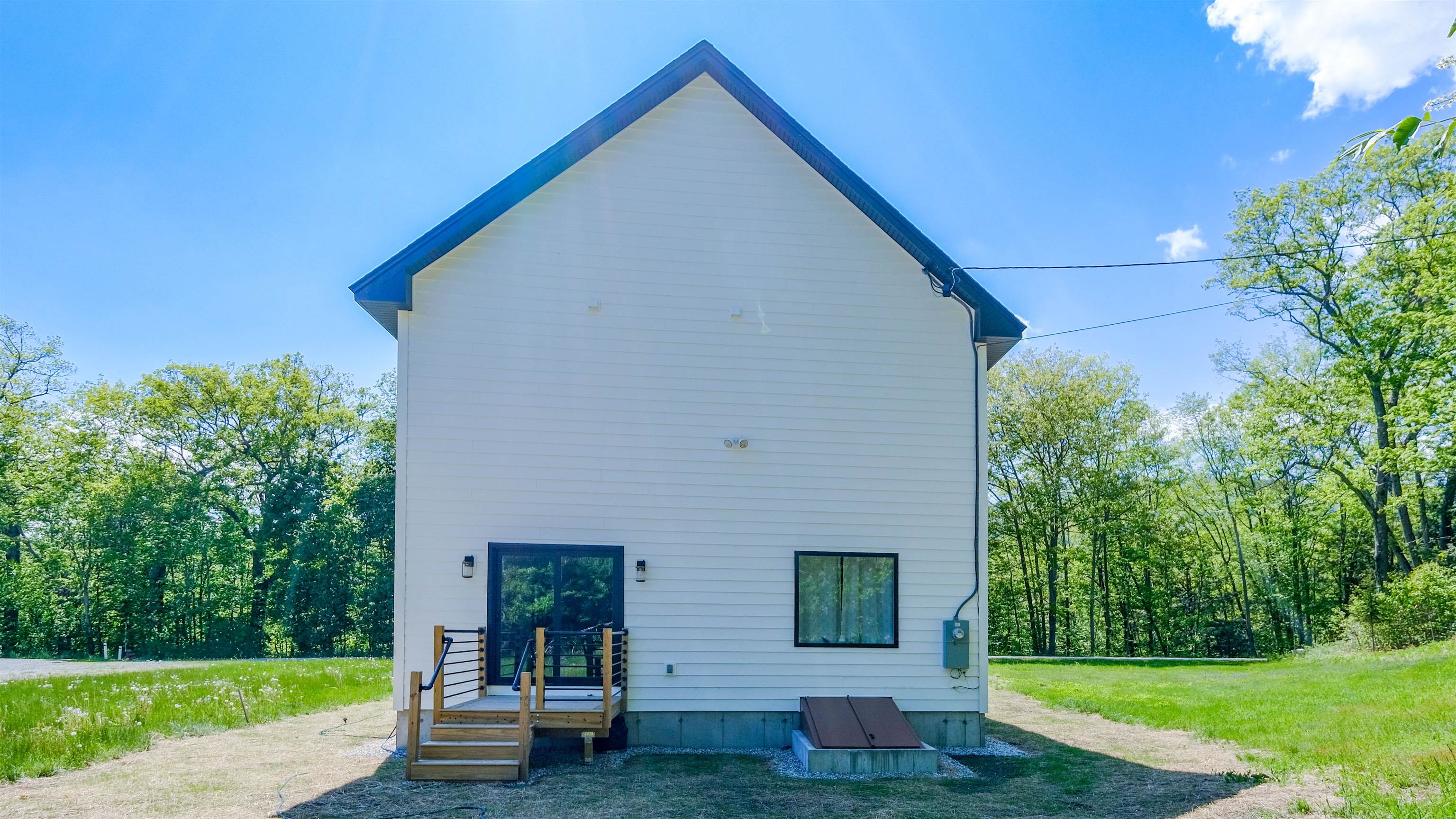 Back of house with deck 25416823
