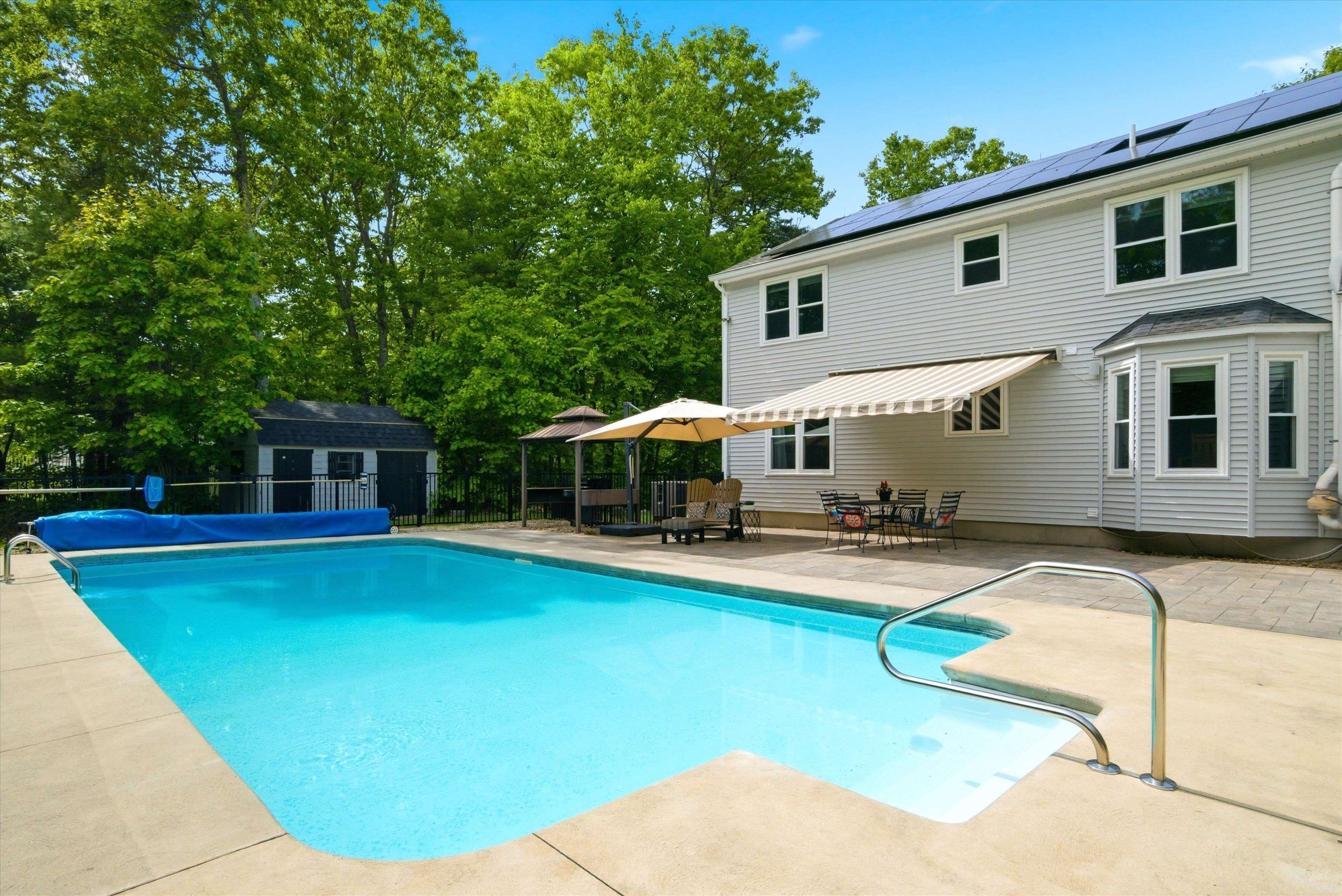 Your backyard oasis equipped with a retractable awning.  Chef